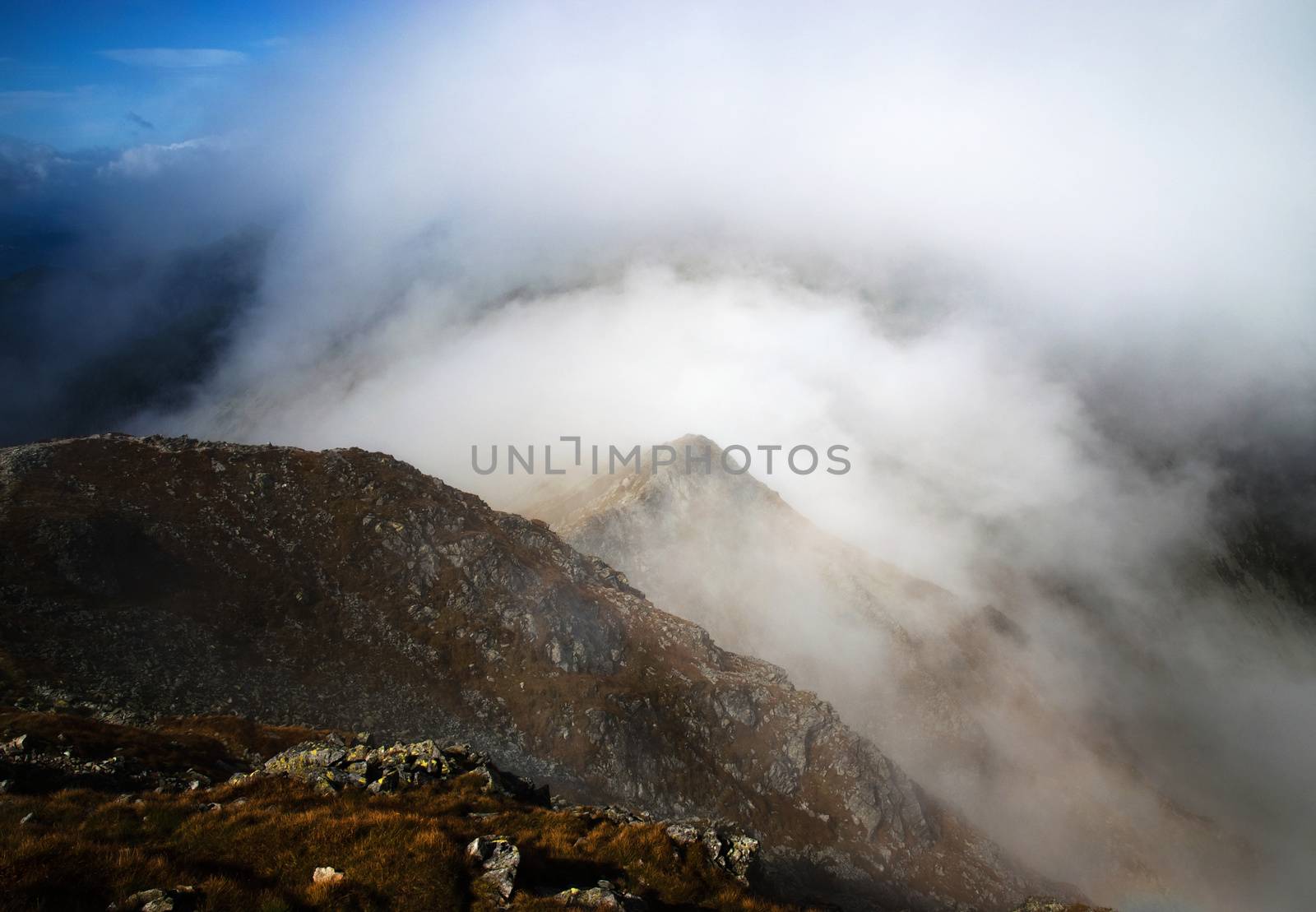 nature lanscape background fog lying over the top of the mountain