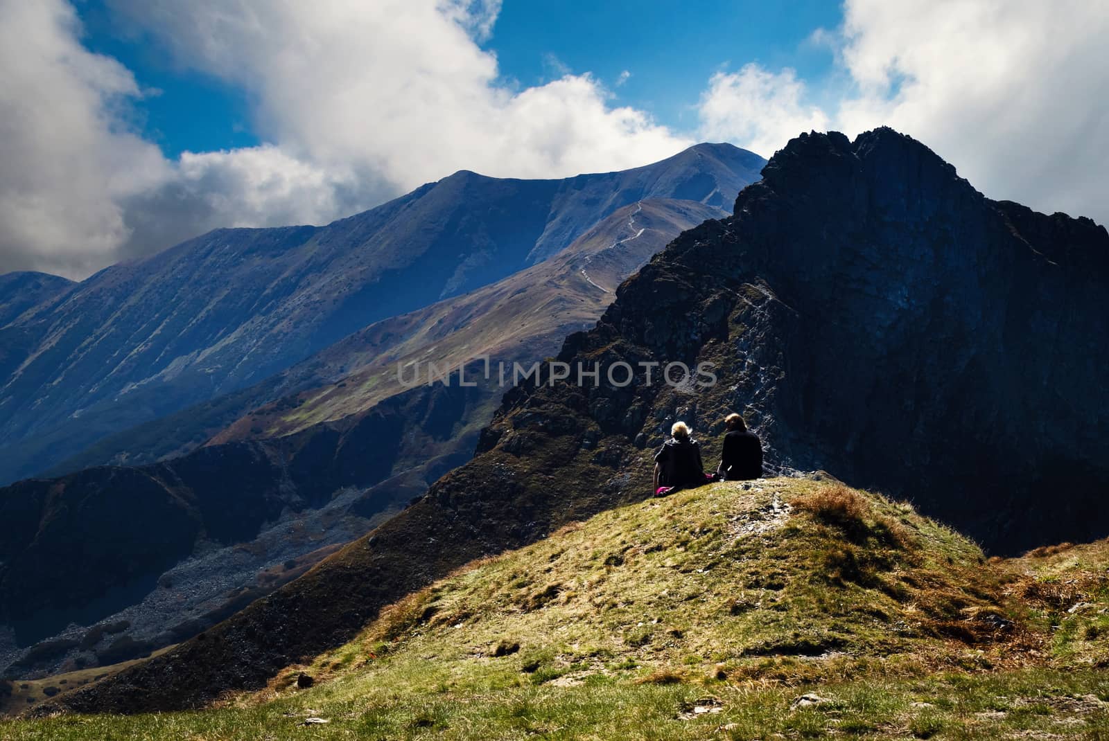 two figures in high mountains by Ahojdoma