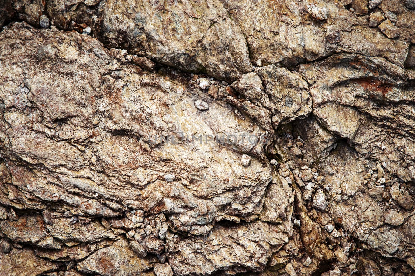 abstract background or texture small stones on the cracked mica