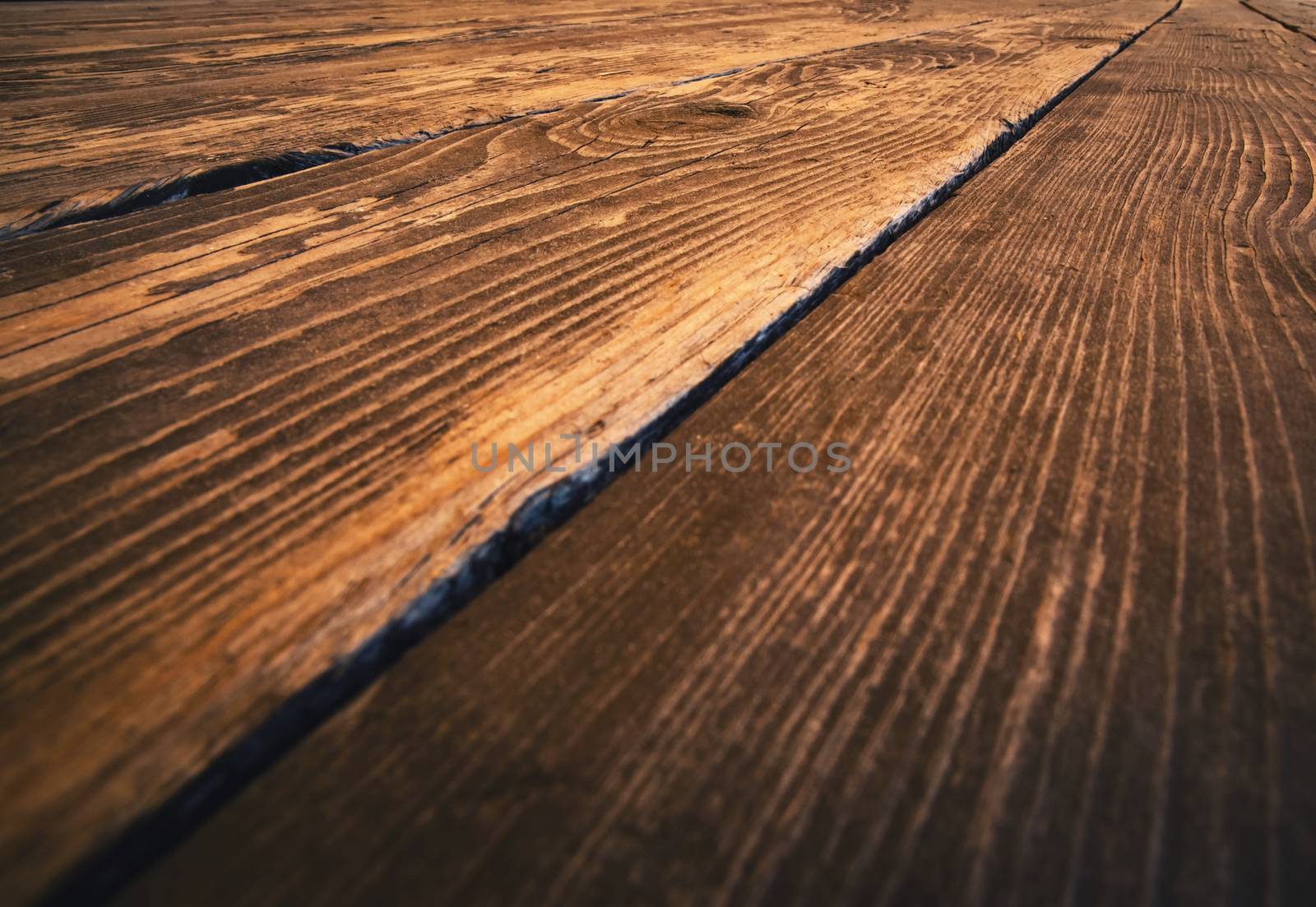 detail of brown wood floorboard by Ahojdoma