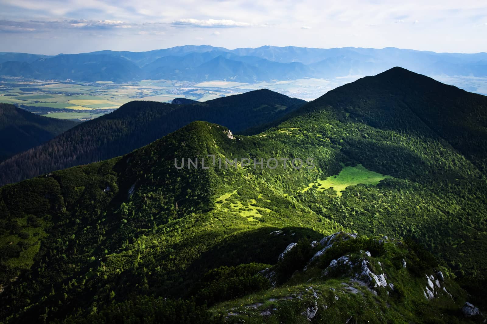 landscape background view of the valley on a mountain green saddle