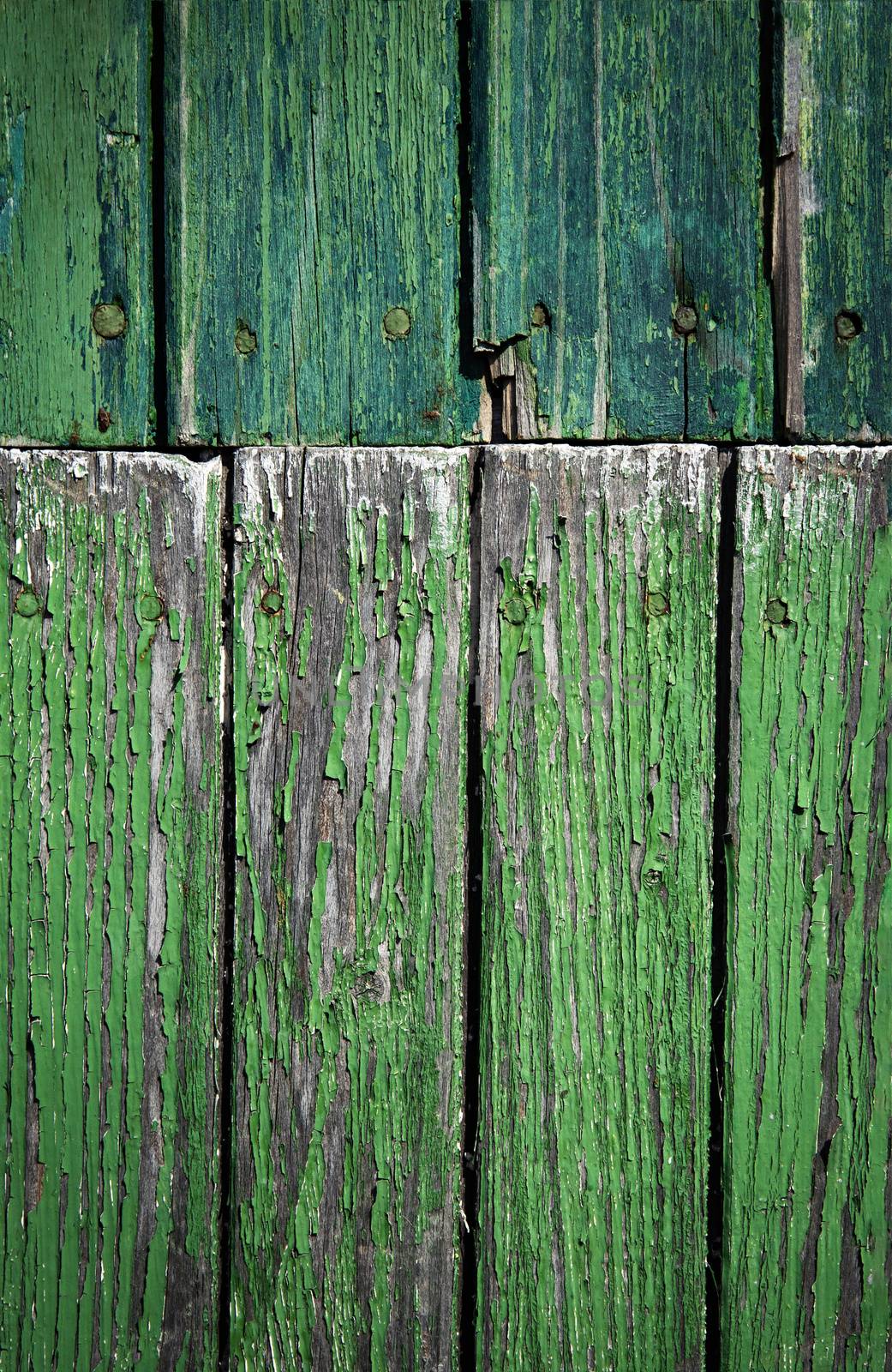 old green paint on a weathered wood by Ahojdoma