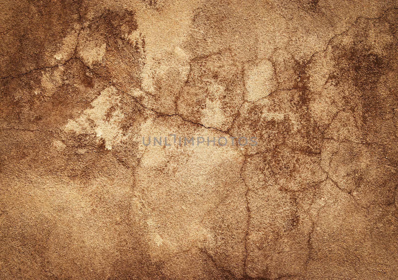 abstract background or texture old ocher plaster with cracks