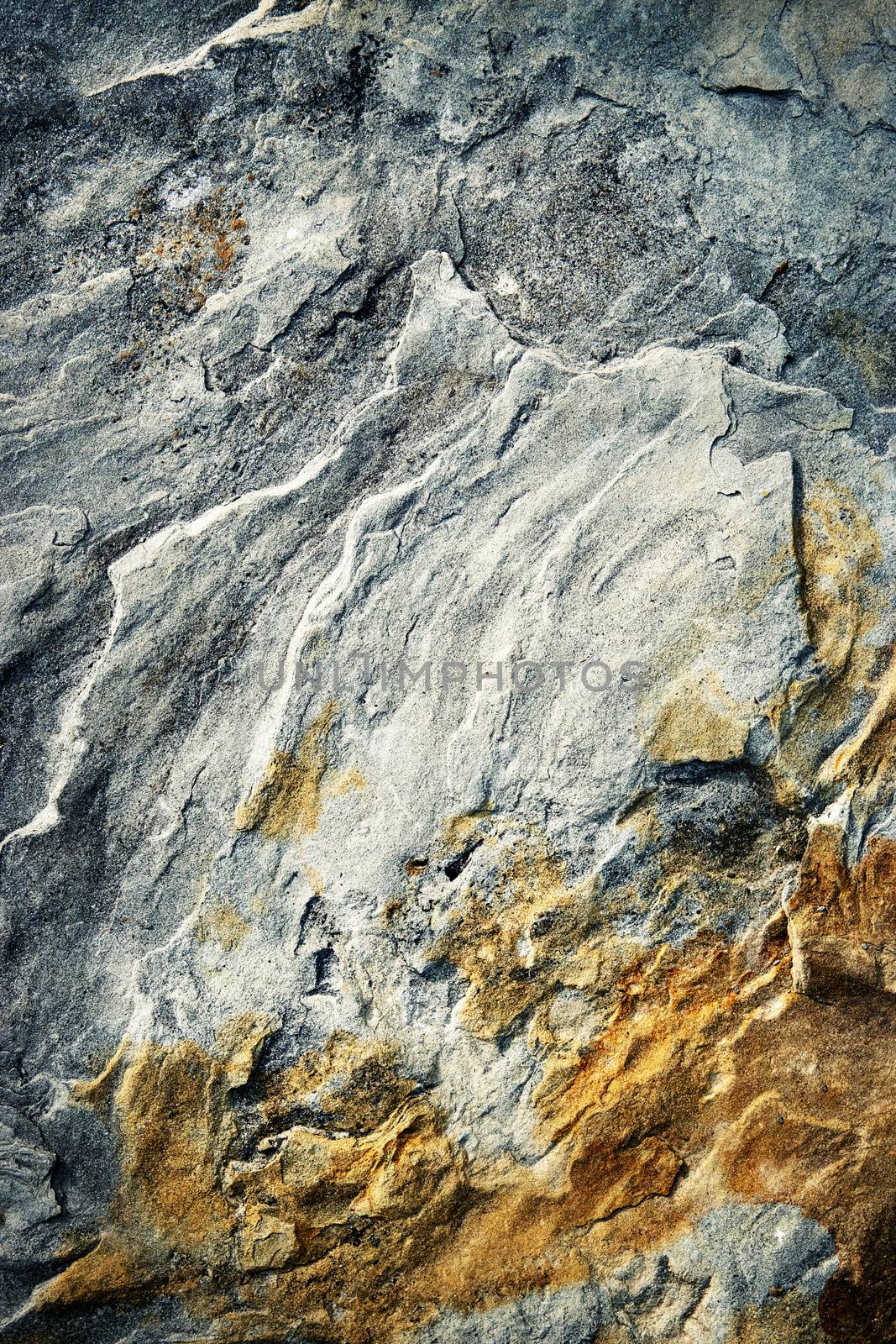 abstract background or texture detail of a fissured sandstone