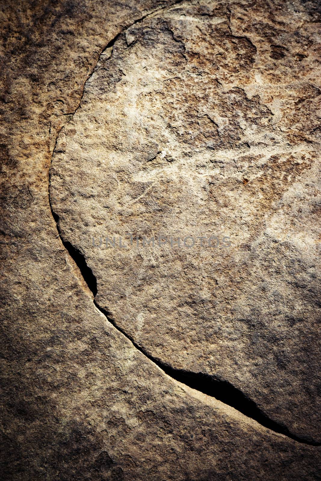 abstract background or texture arched crack on dark stone