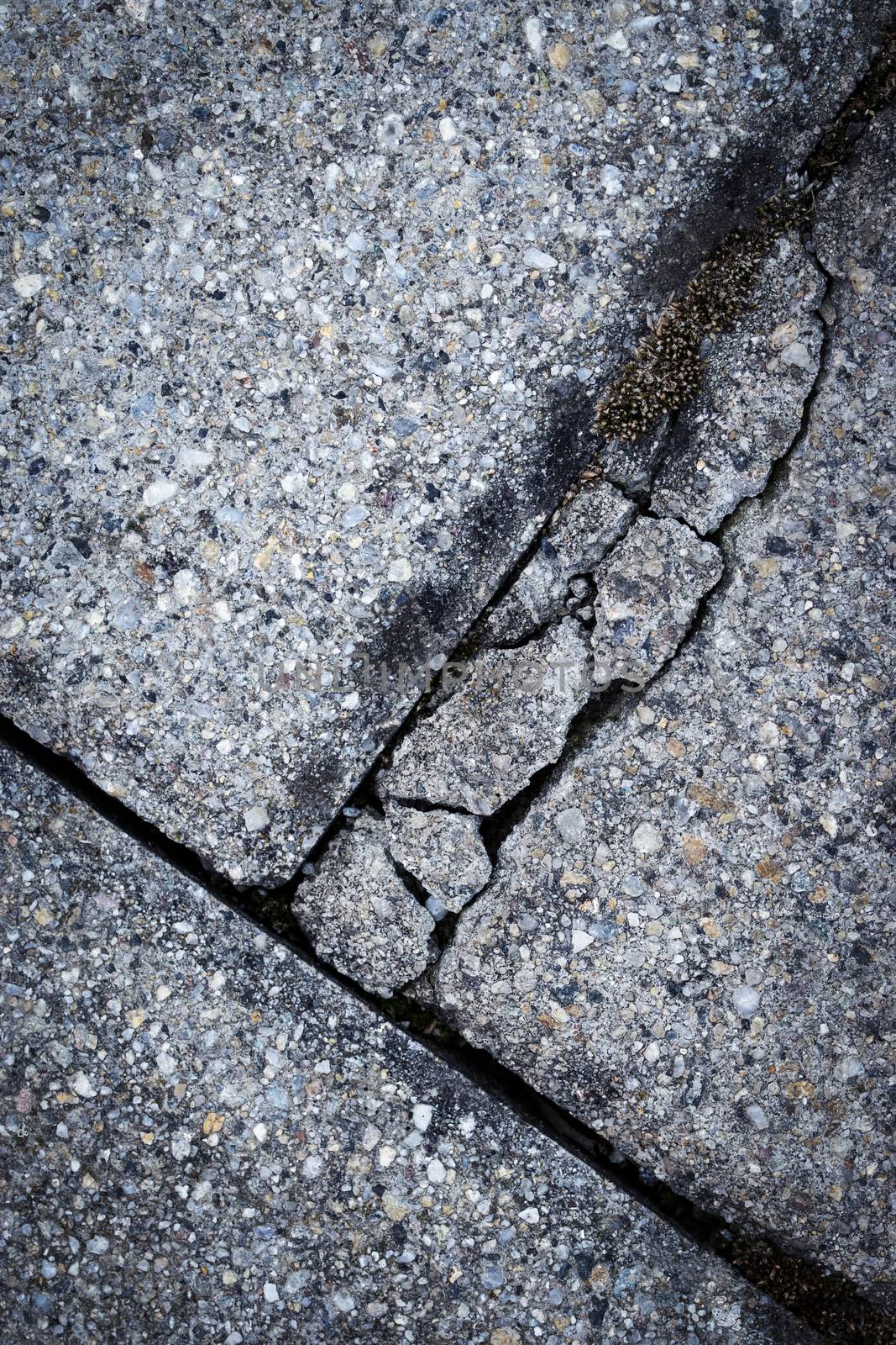 cracked concrete pavement by Ahojdoma