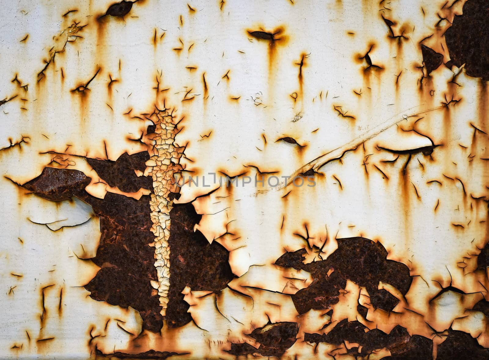 abstract background or texture detail peeled white paint on metal