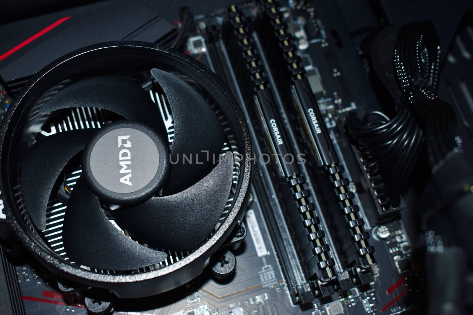 Dublin, Ireland - April 16th 2020: Close up view of an AMD Ryzen 3600 processor and Corsair RAM in a gaming PC by benentaylor