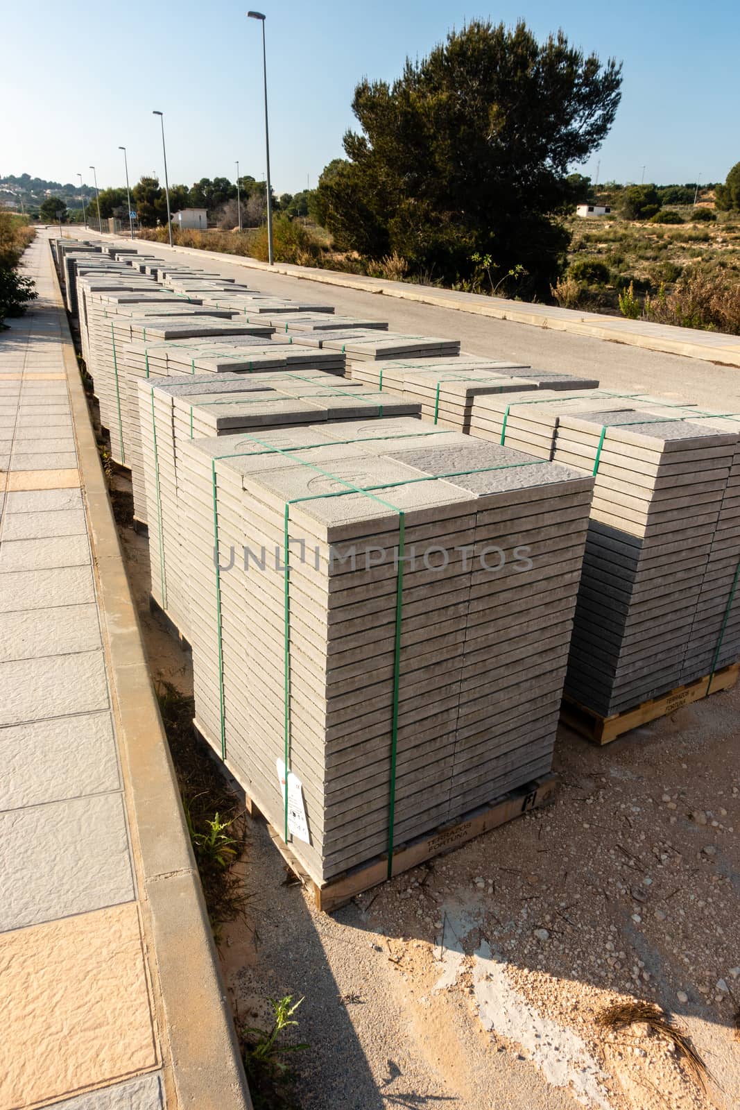 paving slabs stacked at roadside ready for use