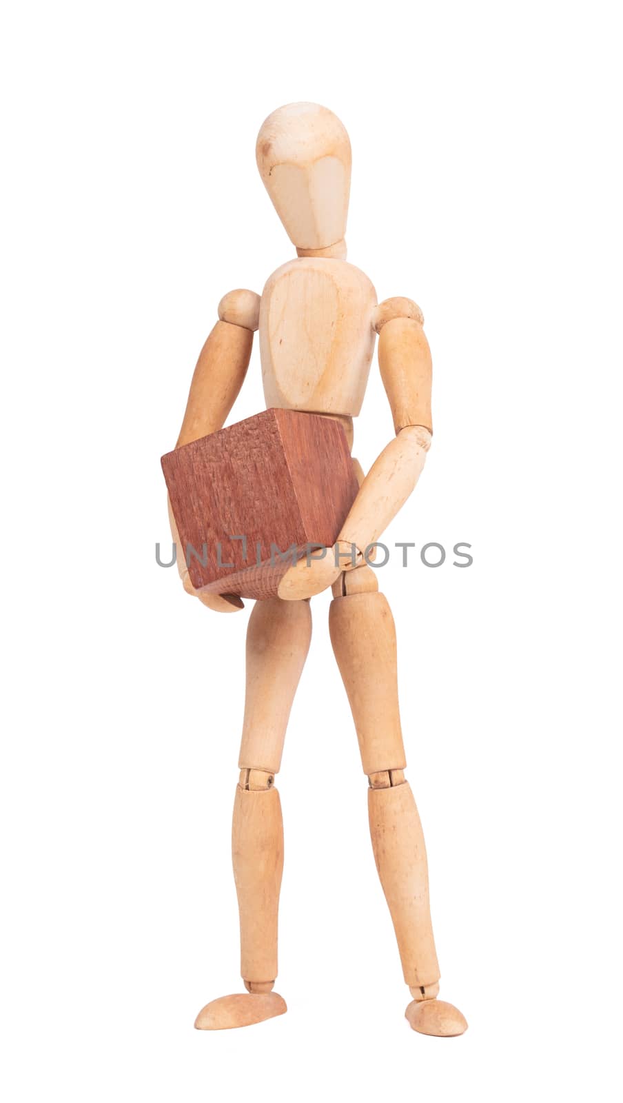 Wooden mannequin carrying a wooden hardwood block, isolated on white