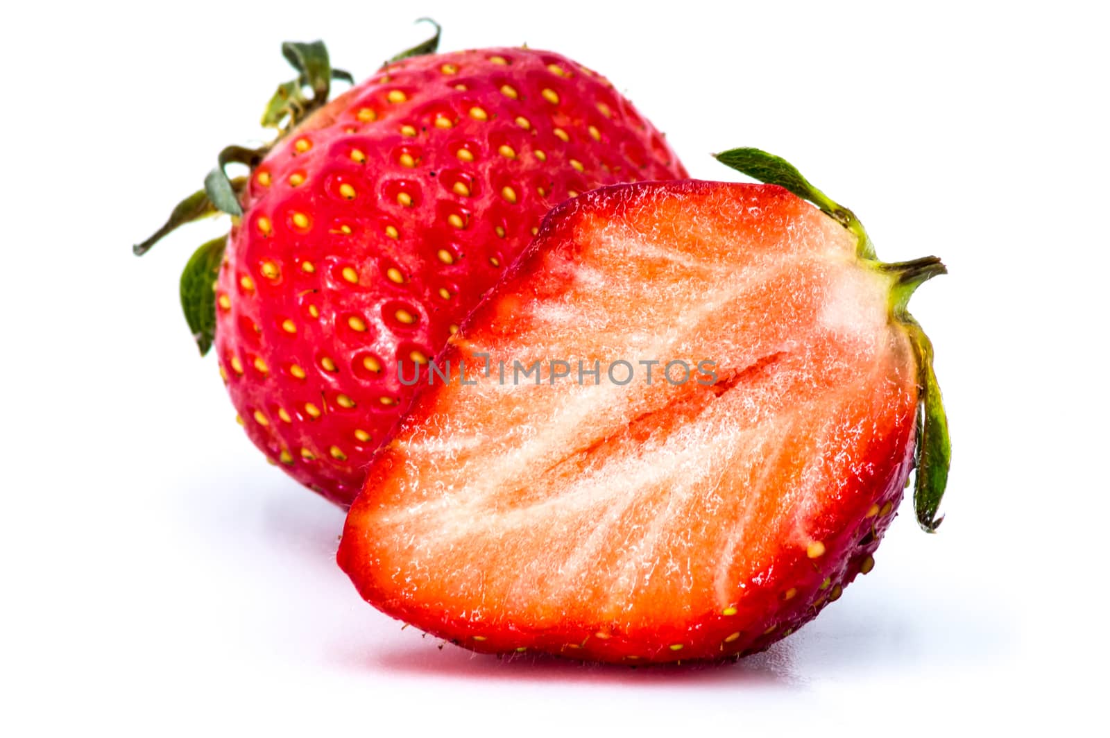 Strawberry with leaves isolated on white background with clipping path