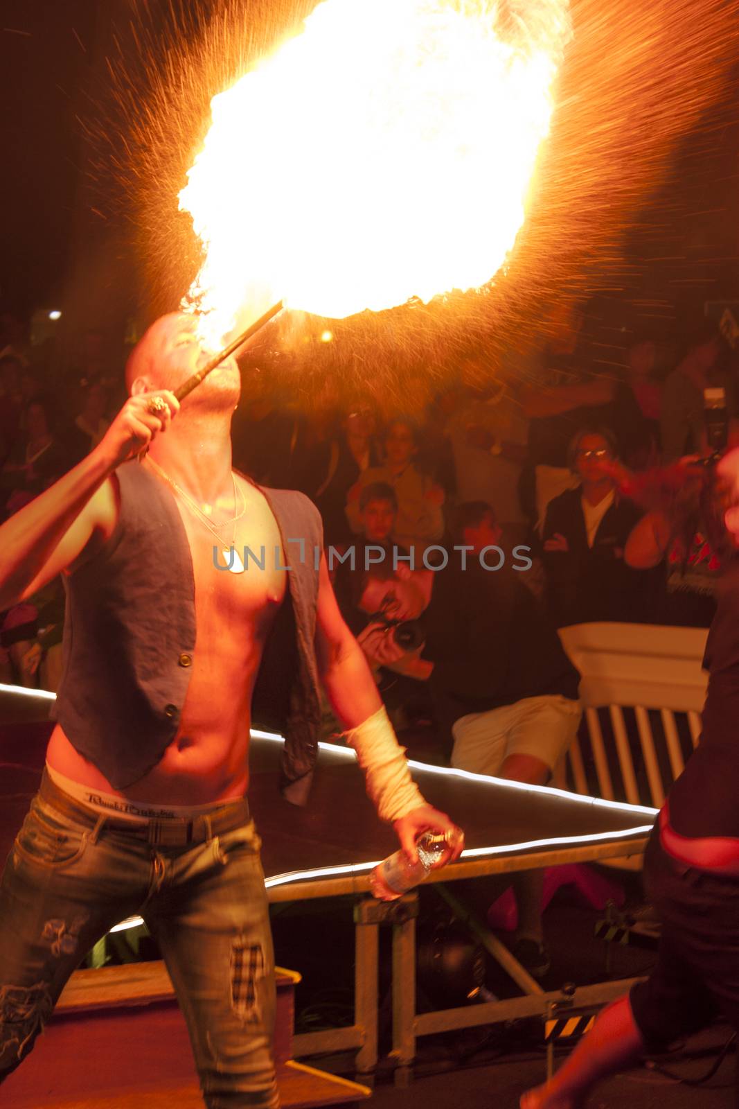 LOREO, ITALY 24 MARCH 2020: Fire eaters They perform a show to the public