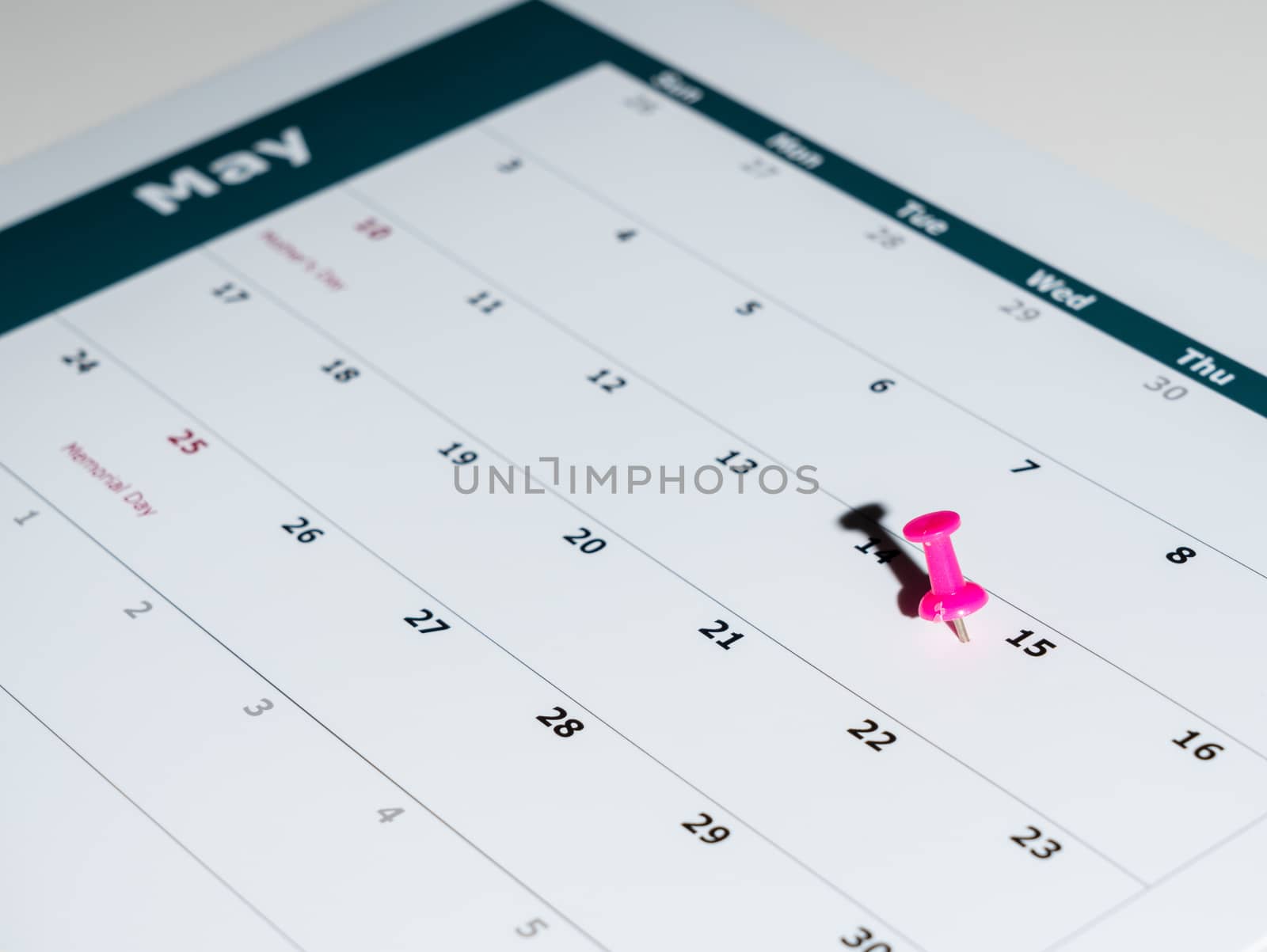 Reminder for sending income tax return for May 15 2020 tax day due to Covid-19 virus delay using calendar page and pin