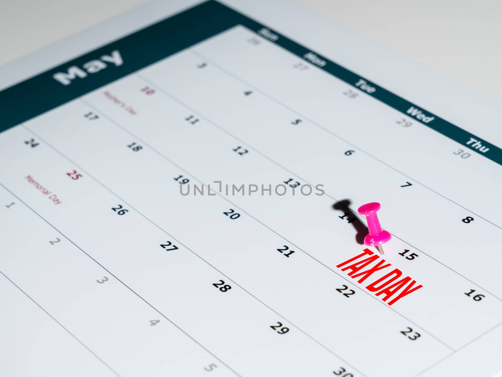 Reminder for sending income tax return for May 15 2020 tax day due to Covid-19 virus delay using calendar page and pin