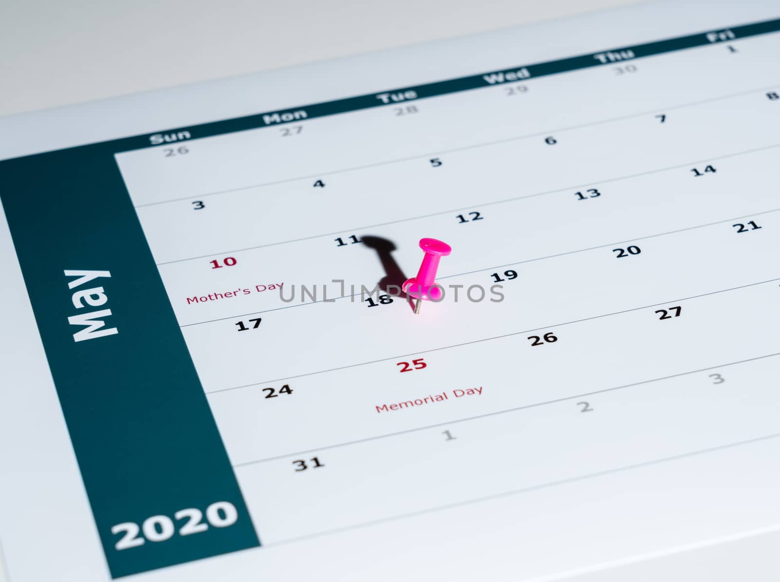 Reminder for sending income tax return for May 18 2020 tax day due to Covid-19 virus delay using calendar page and pin