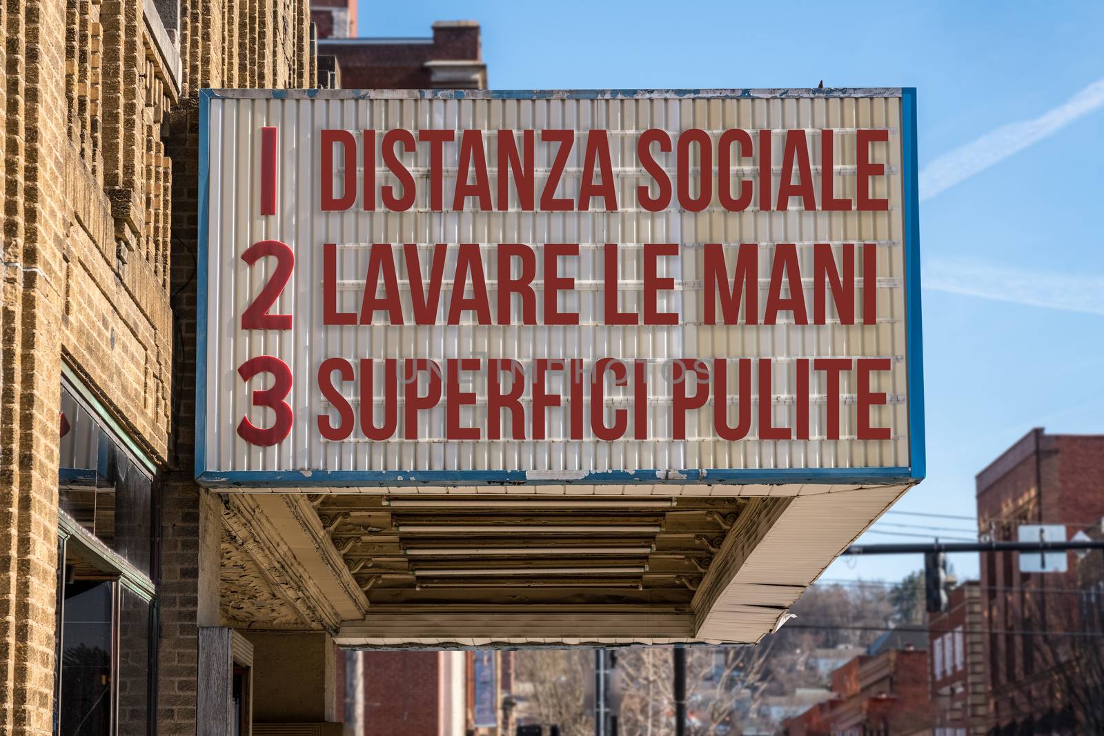 Italian movie cinema billboard with three rules to avoid the coronavirus epidemic. Translation, wash hands, maintain social distance, clean surfaces