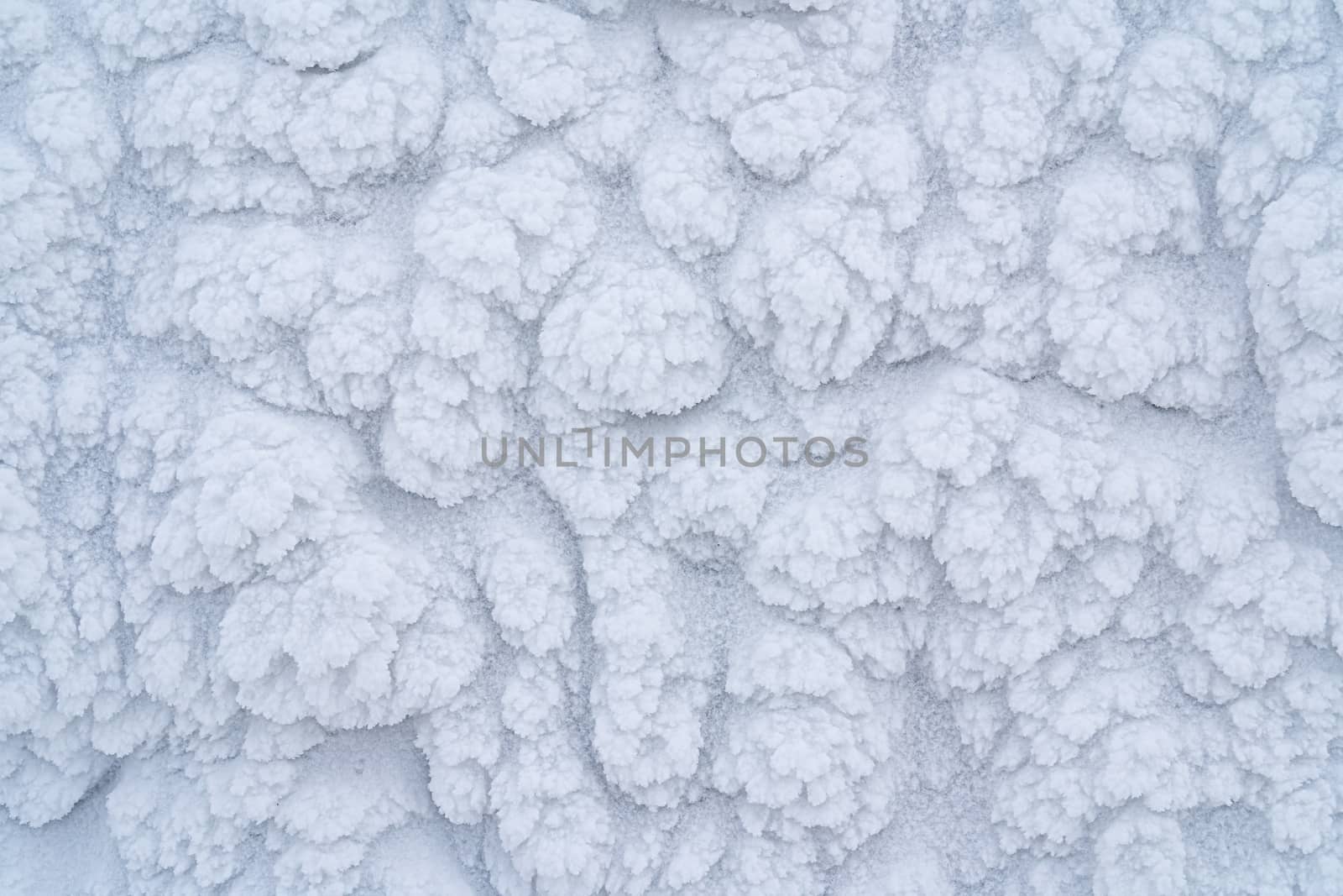 Icy texture of snow after a blizzard on a windy morning. by petrsvoboda91