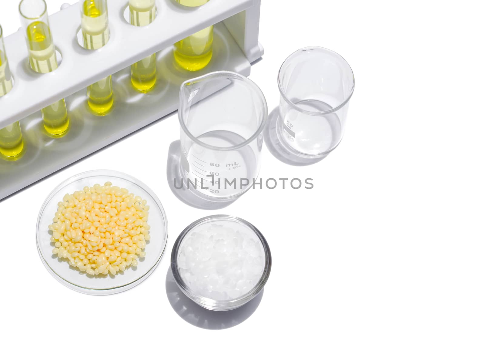 Cosmetic chemicals ingredient on white laboratory table. Candelilla Wax SP-75, Microcrystalline wax sp-623.
