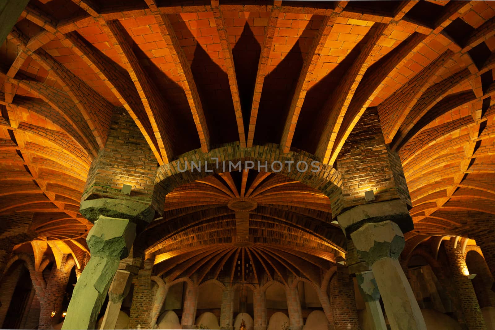 Santa Coloma de Cervello, Spain - 15 January 2019: Church of Colonia Guel interior ceiling and columns