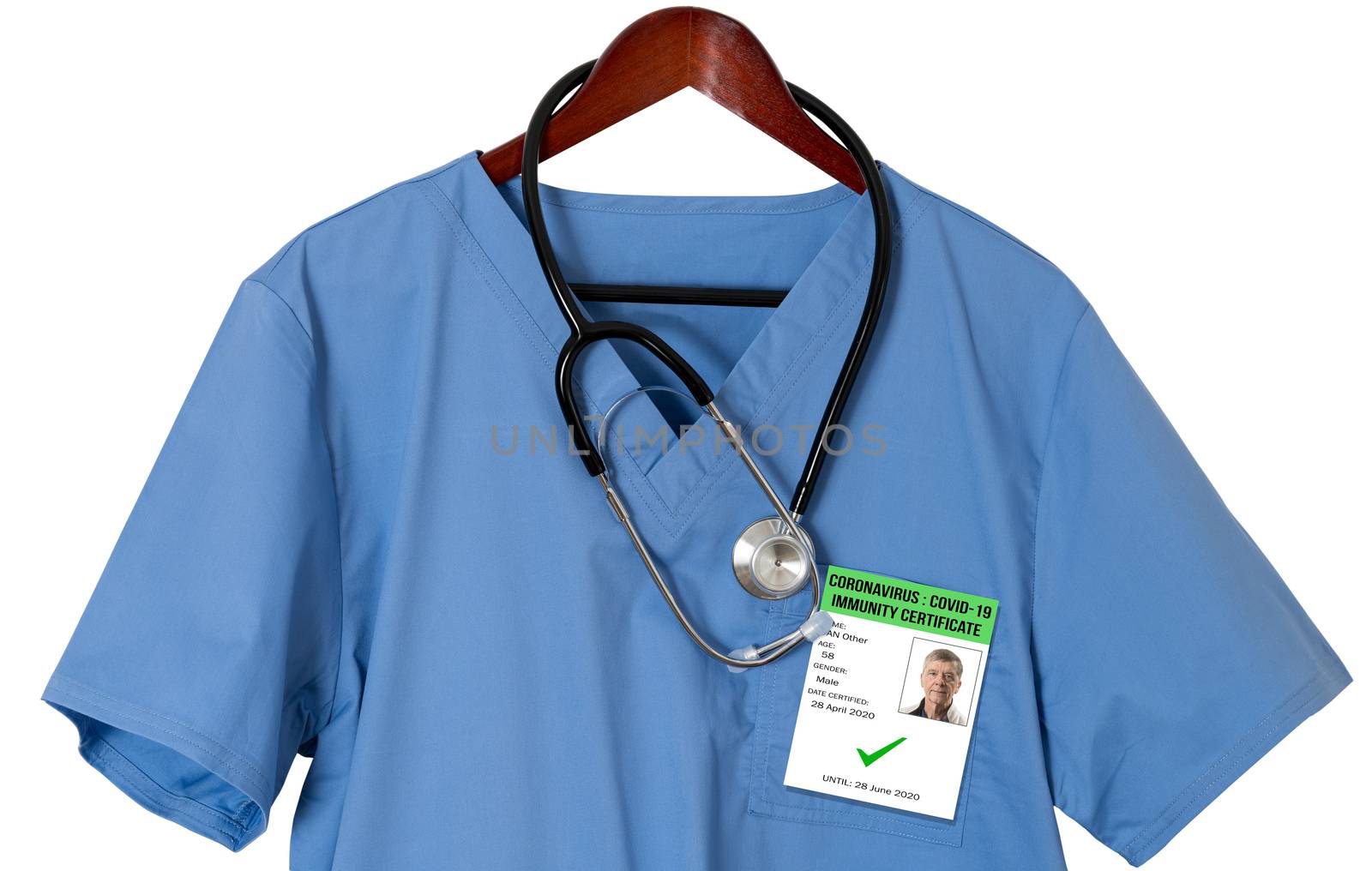 Blue medical scrubs uniform shirt on a hanger with stethoscope and badge for coronavirus immunity certificate
