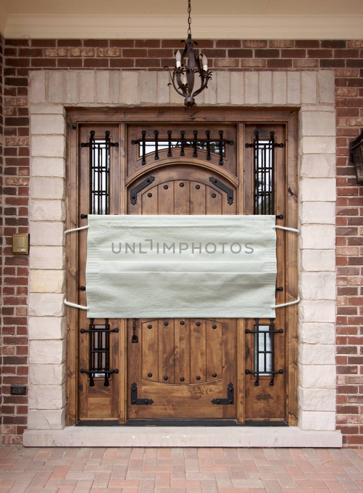 Medical Face Mask Covering Front Door of House by Feverpitched