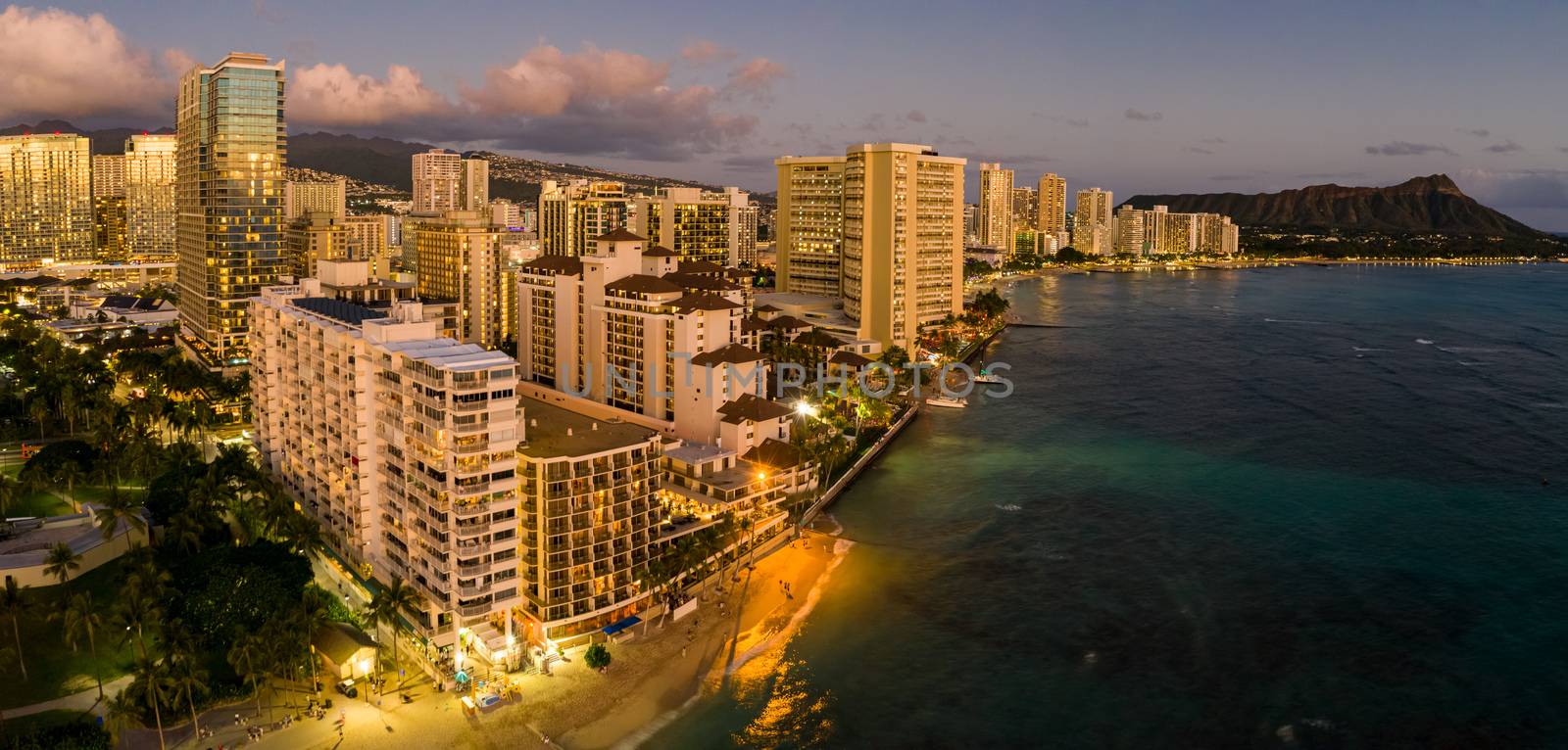 Aerial panorama of Waikiki beach and Diamond Head on Oahu, Hawaii at sunset