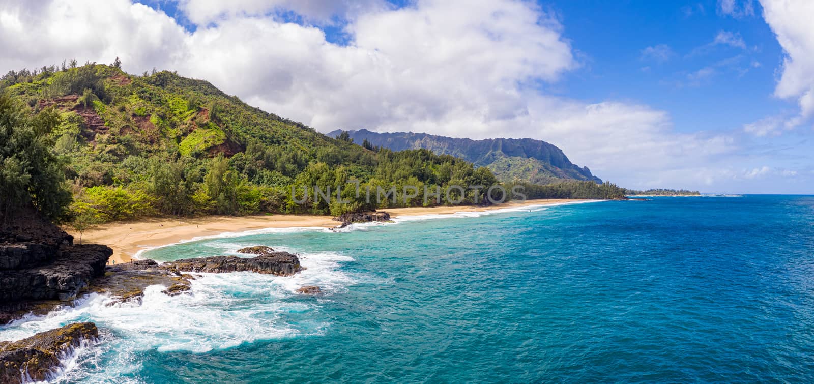 Aerial drone shot of Lumahai Beach on the north shore of Kauai in Hawaii by steheap