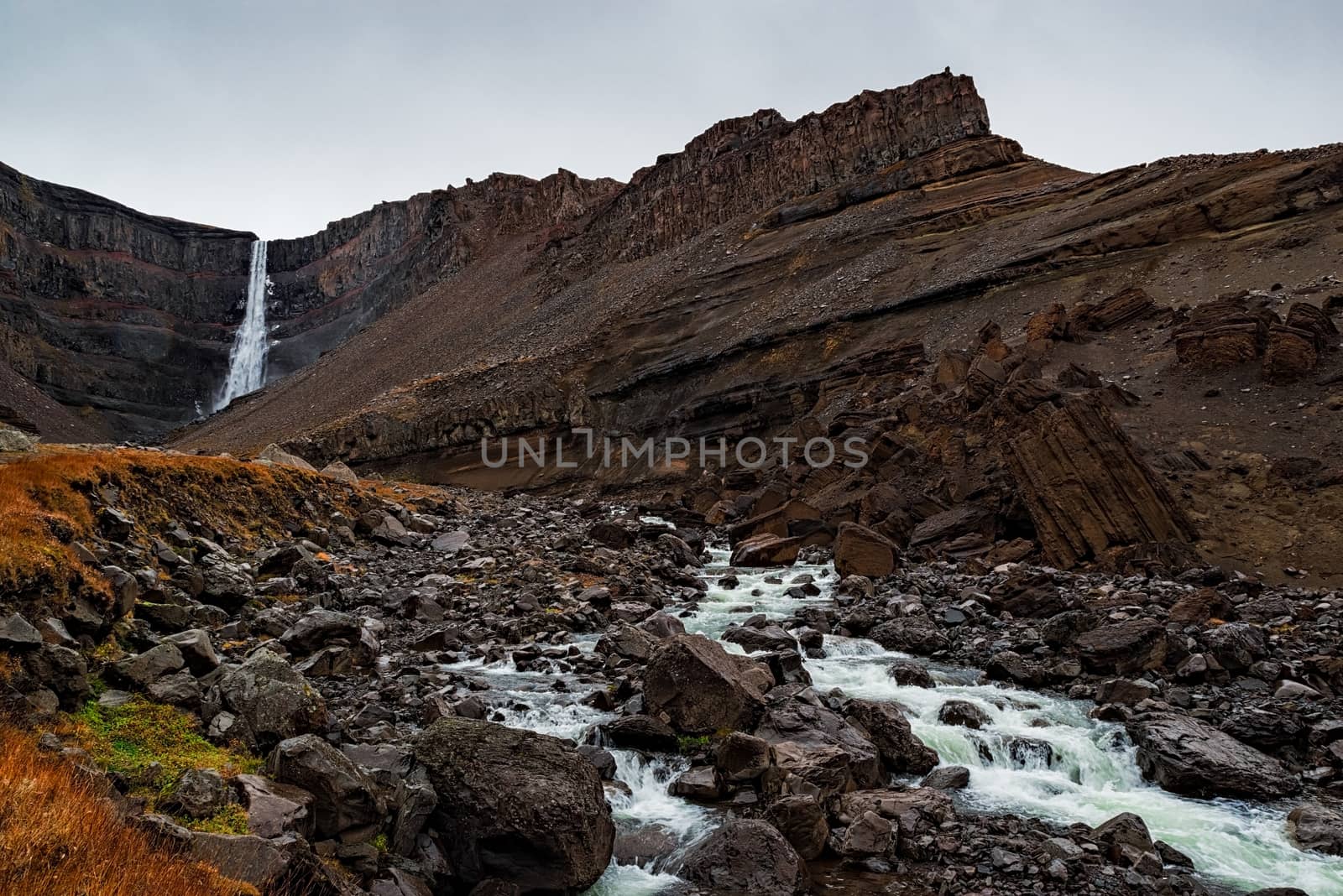 Hengifoss waterfall in eastside of Iceland in a cloudy day