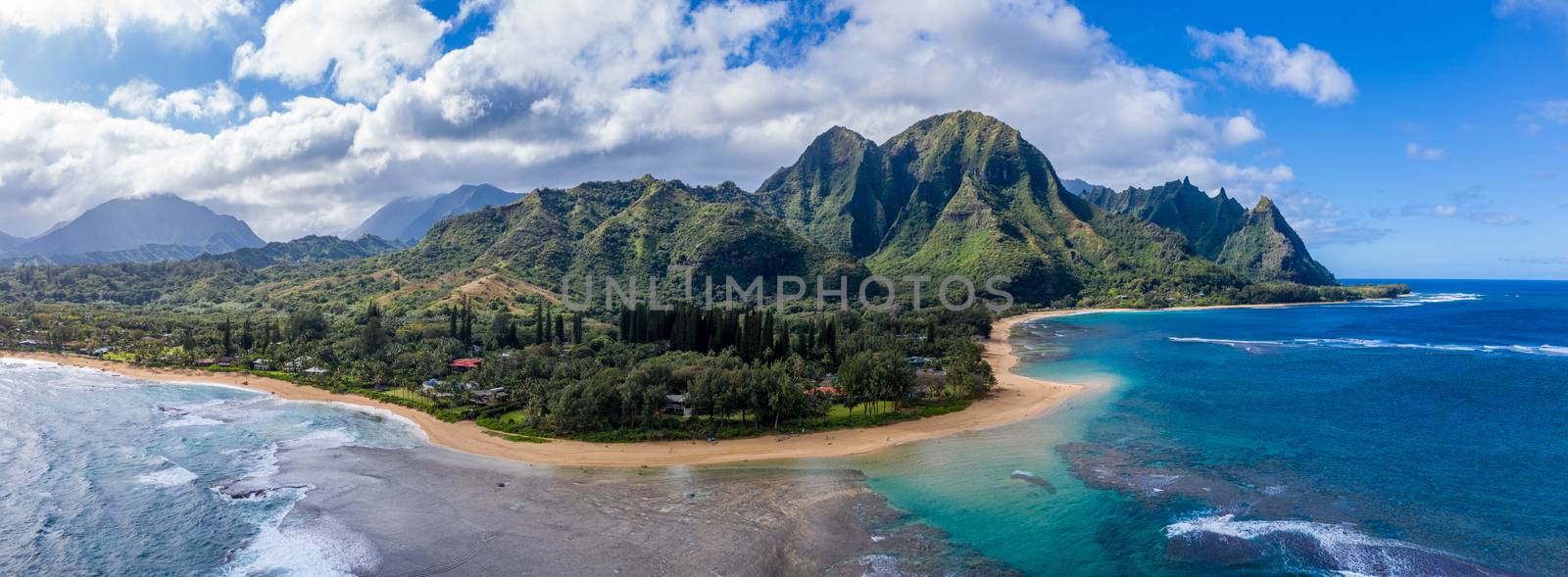 Aerial drone shot of Tunnels Beach on the north shore of Kauai in Hawaii by steheap