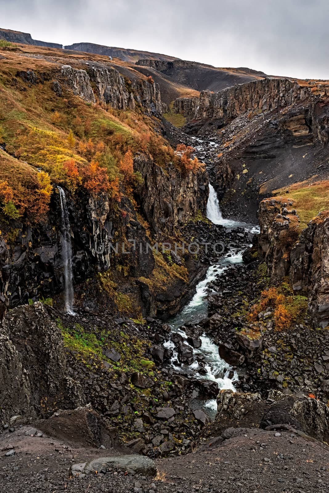 Hengifoss and litlanesfoss waterfalls in eastside of Iceland in a cloudy day