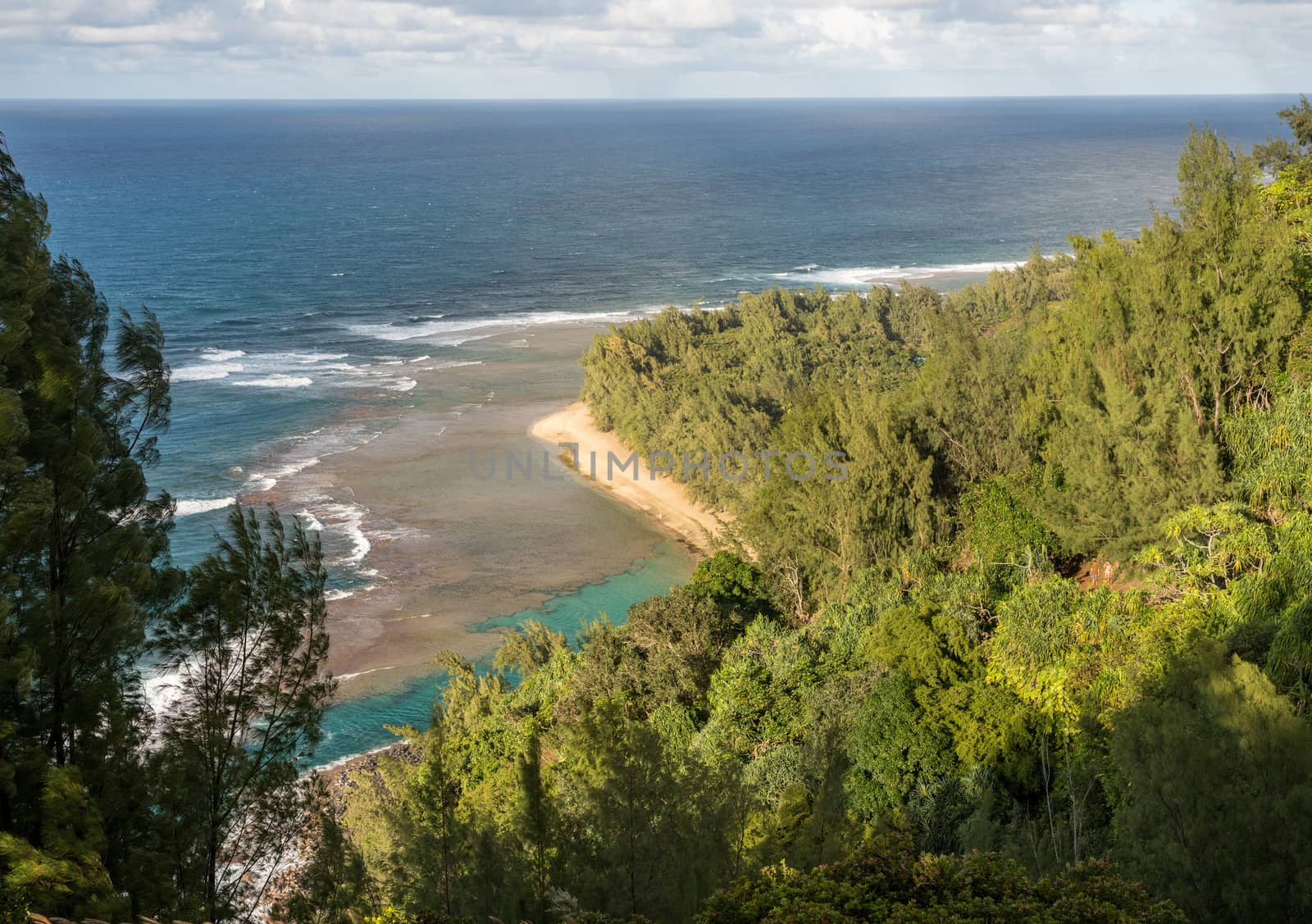 Aerial view down onto Ke'e beach from Kalalau trail on Na Pali coast of Kauai
