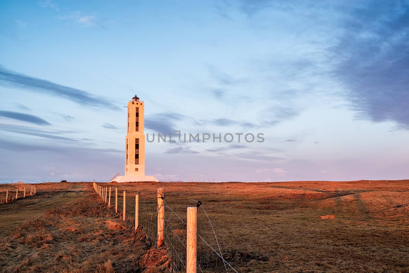Knarraros lighthouse in rural area near Stokkseyri, Iceland