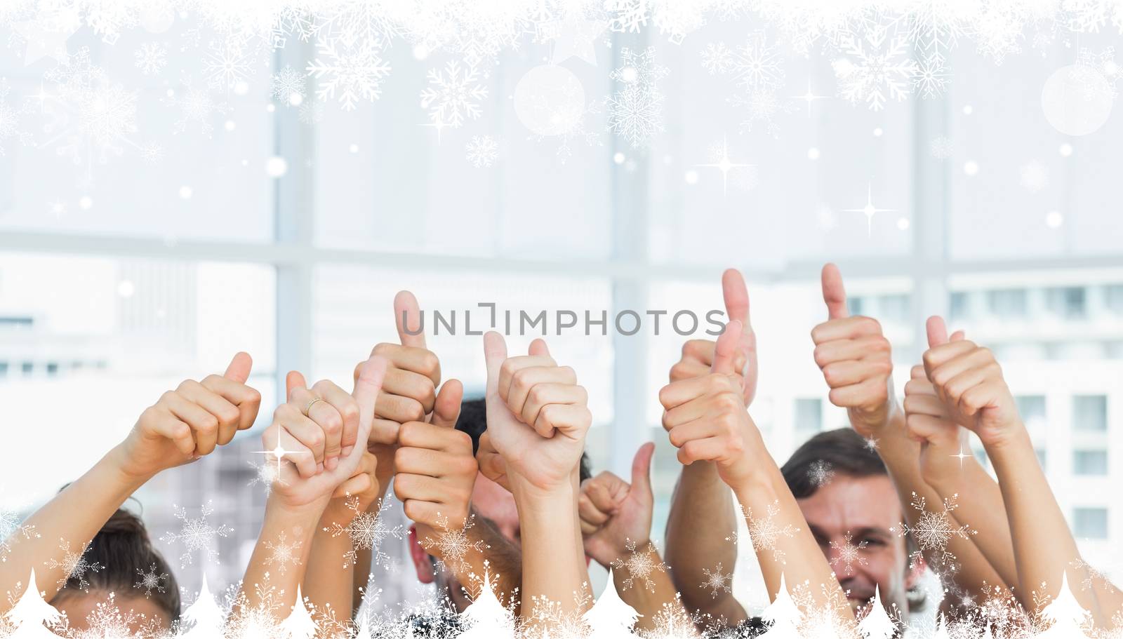 Composite image of a Closeup of cropped people gesturing thumbs up against snow falling