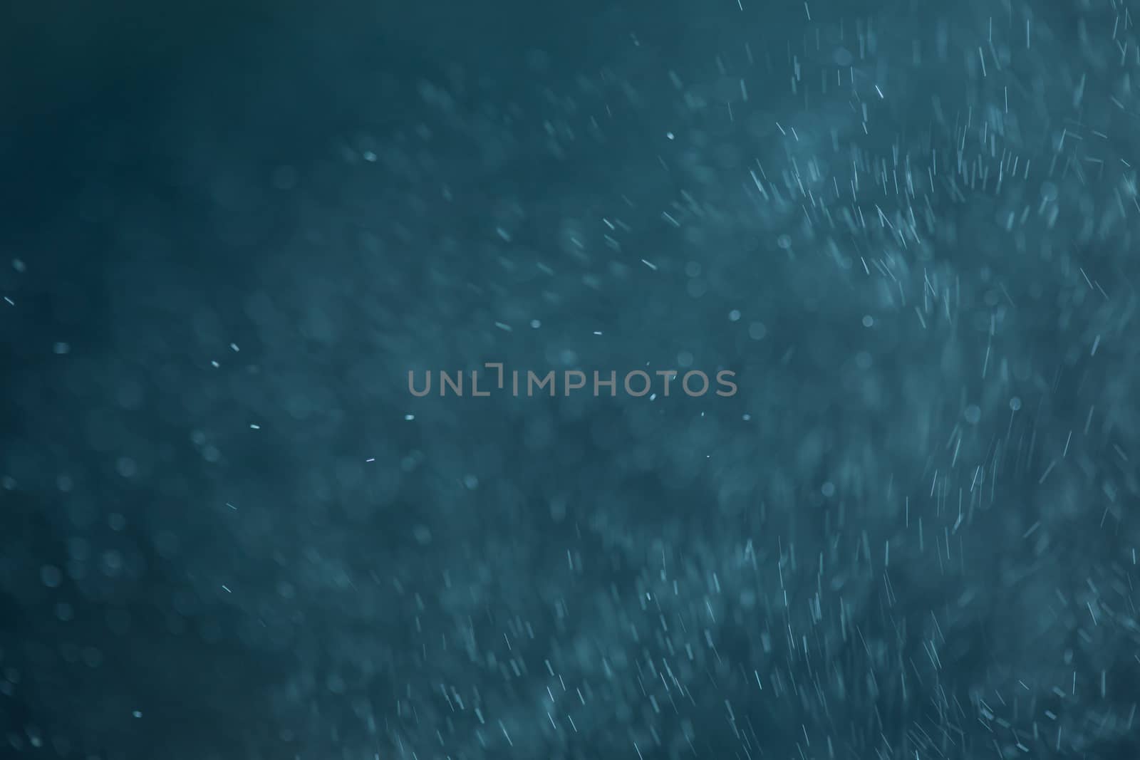 abstract White flakes on blue night background