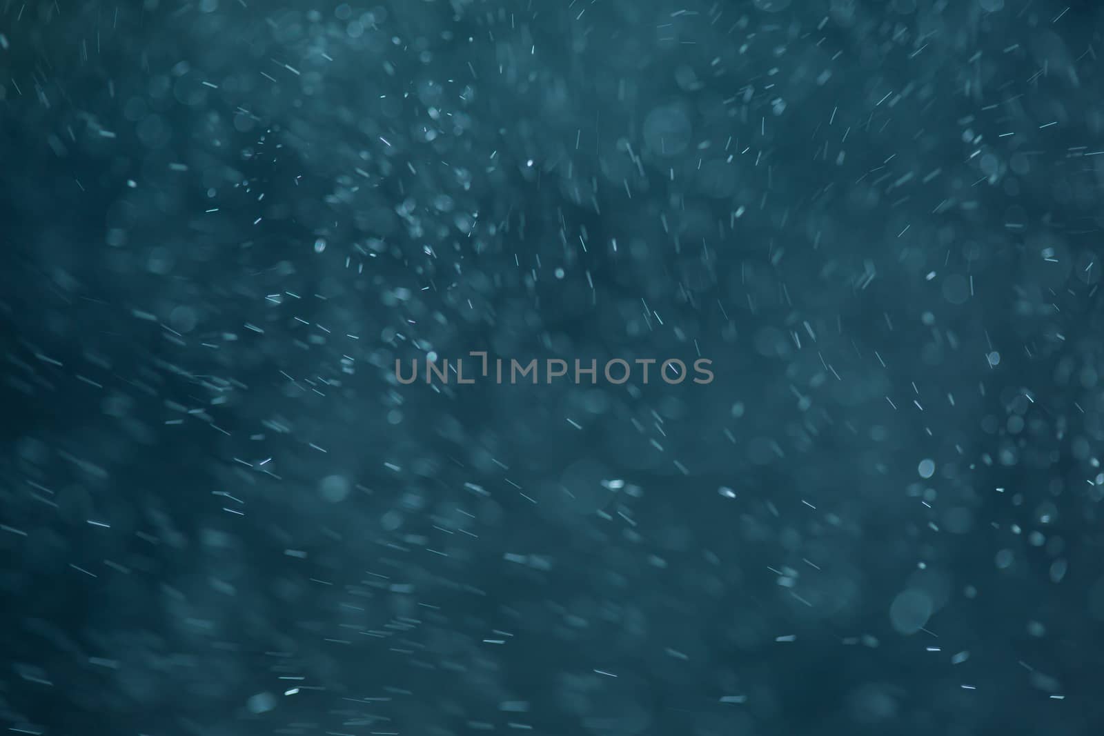 abstract White flakes on blue night background