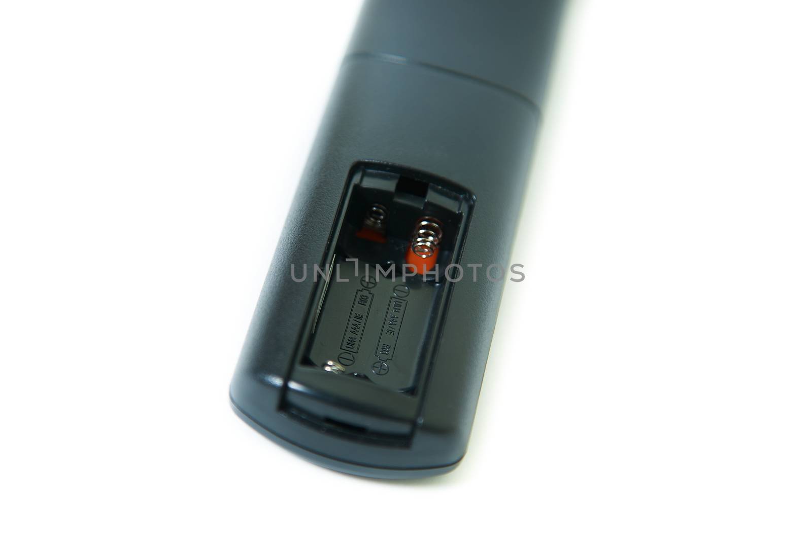 tv remote control on white background at the back battery section