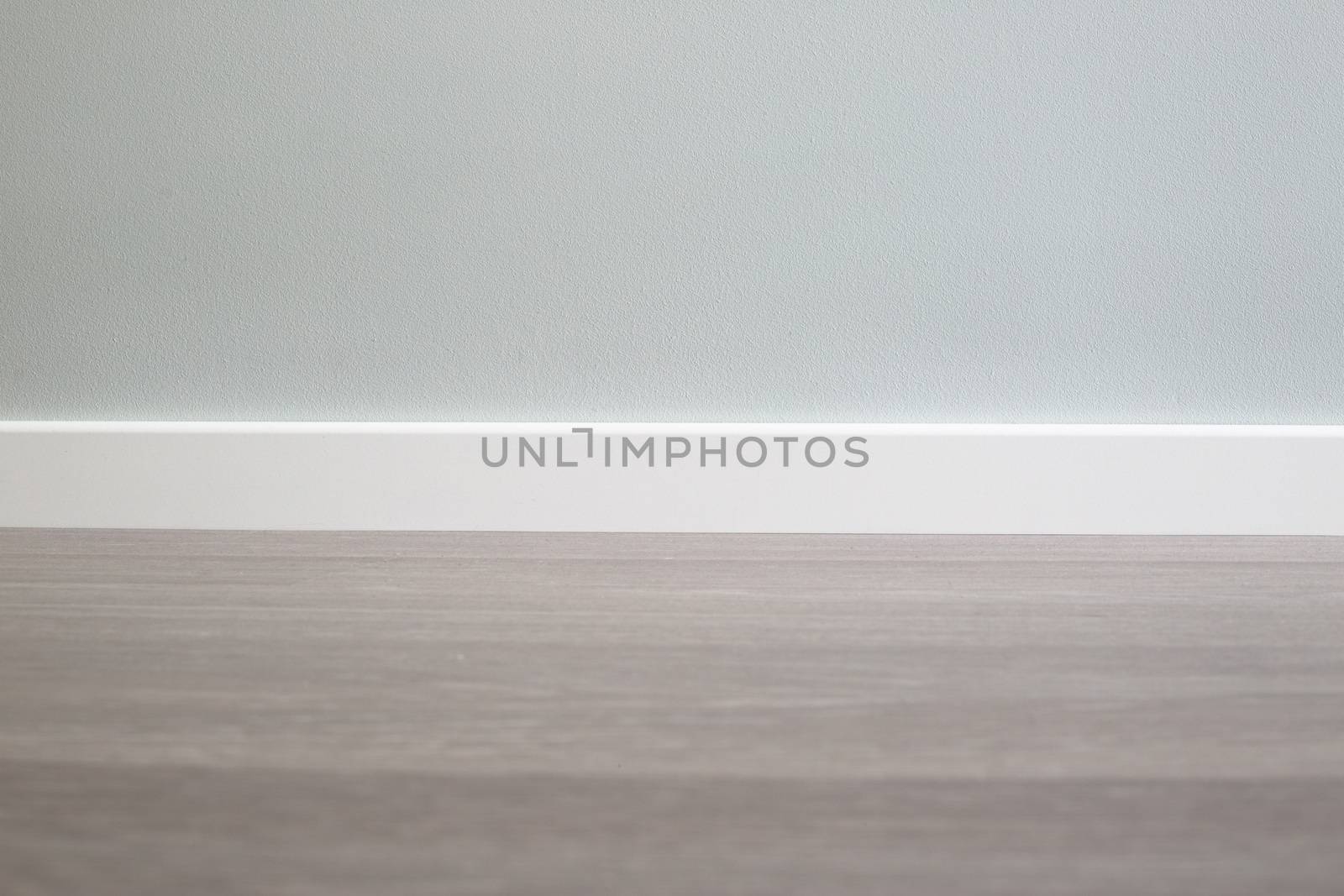 Empty wall and floor background of scandinavian room interior with white plinth close up , copy space for text , renovation , new home ownership concept