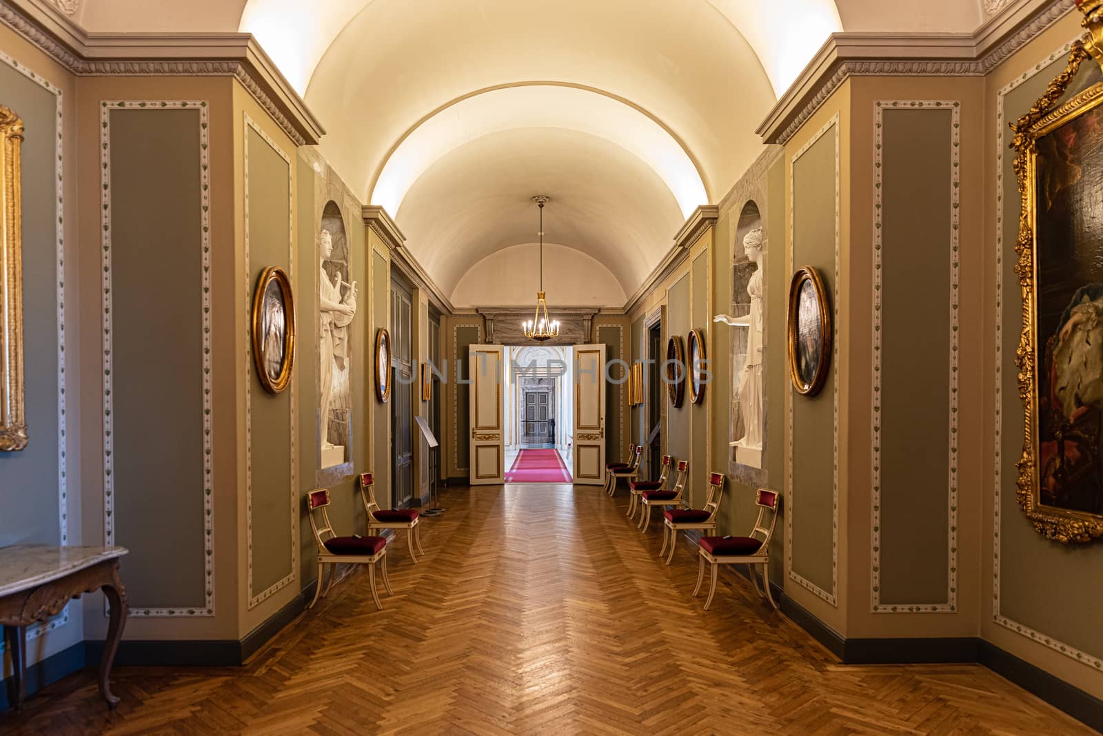 Interiors of royal halls in Christiansborg Palace in Copenhagen Denmark, corridor with antique furniture and paintings
