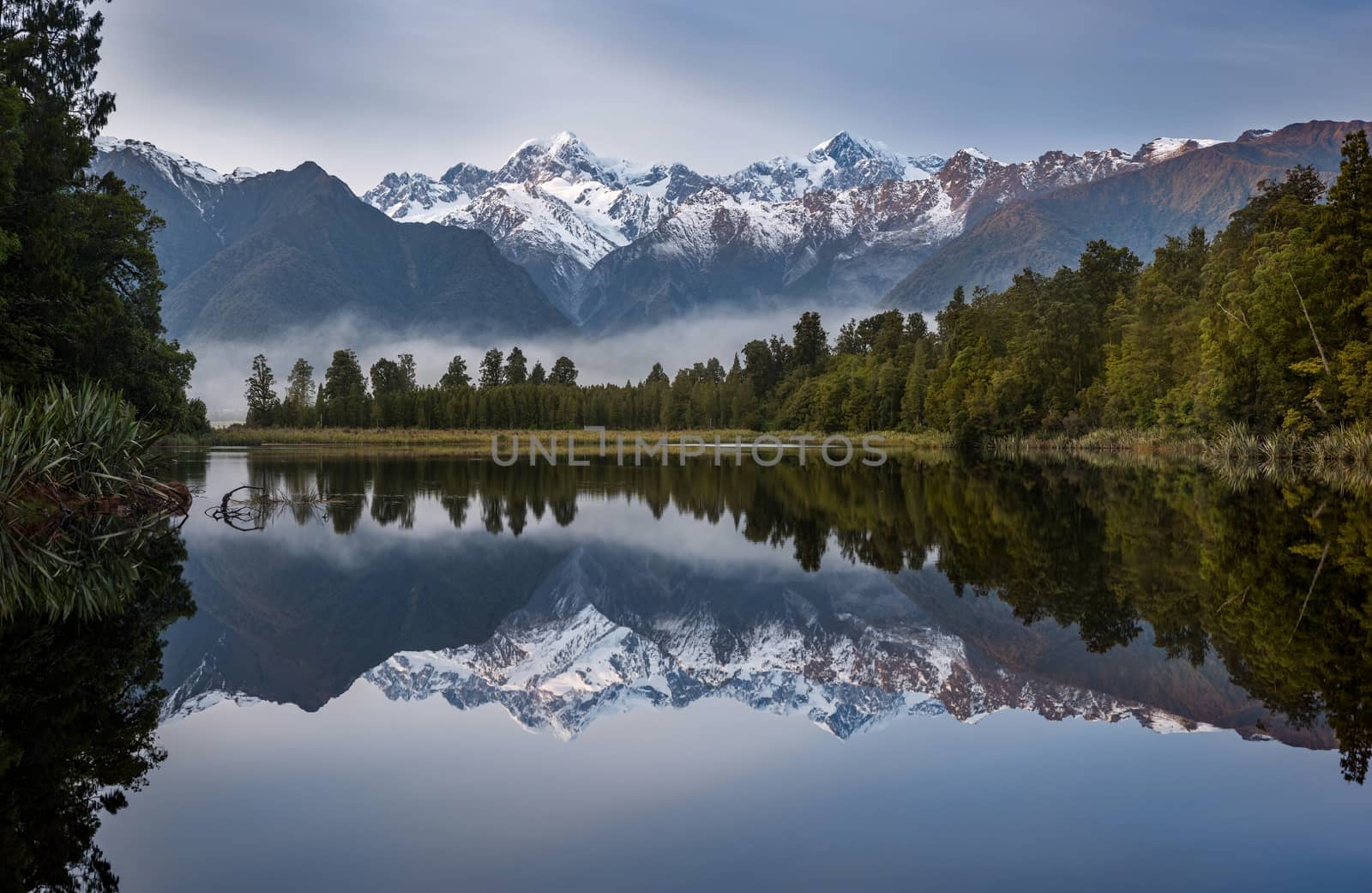 Lake Matheson in West Coast of South Island of New Zealand morning seen, natural landscape background