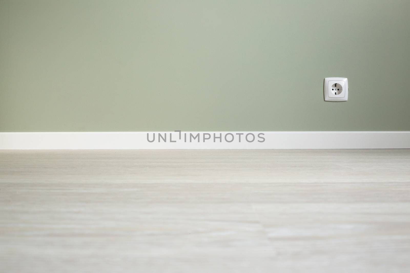 Empty wall and floor background of scandinavian room interior with white plinth and socket close up , copy space for text , renovation , new home ownership concept