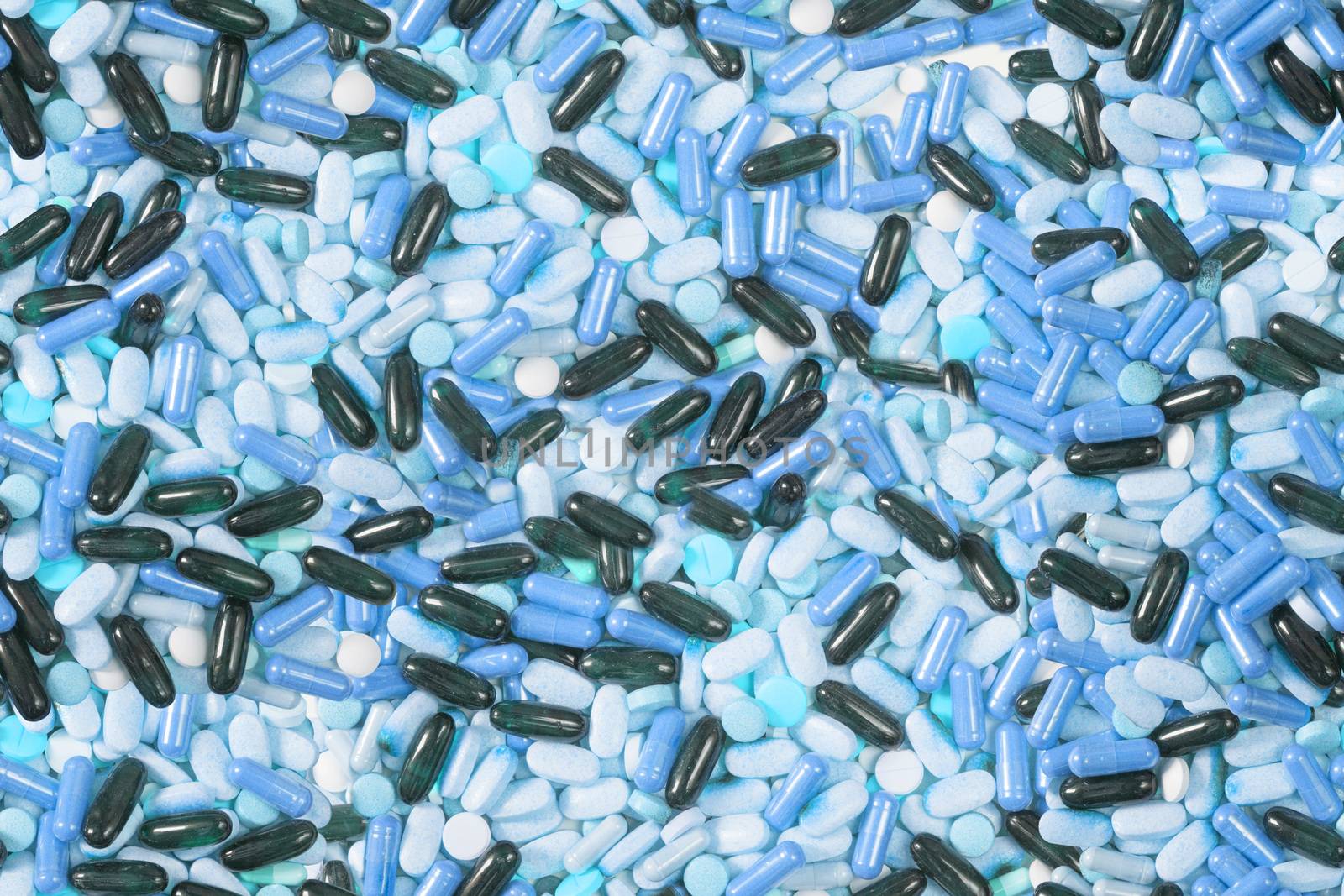 Many pills background by destillat