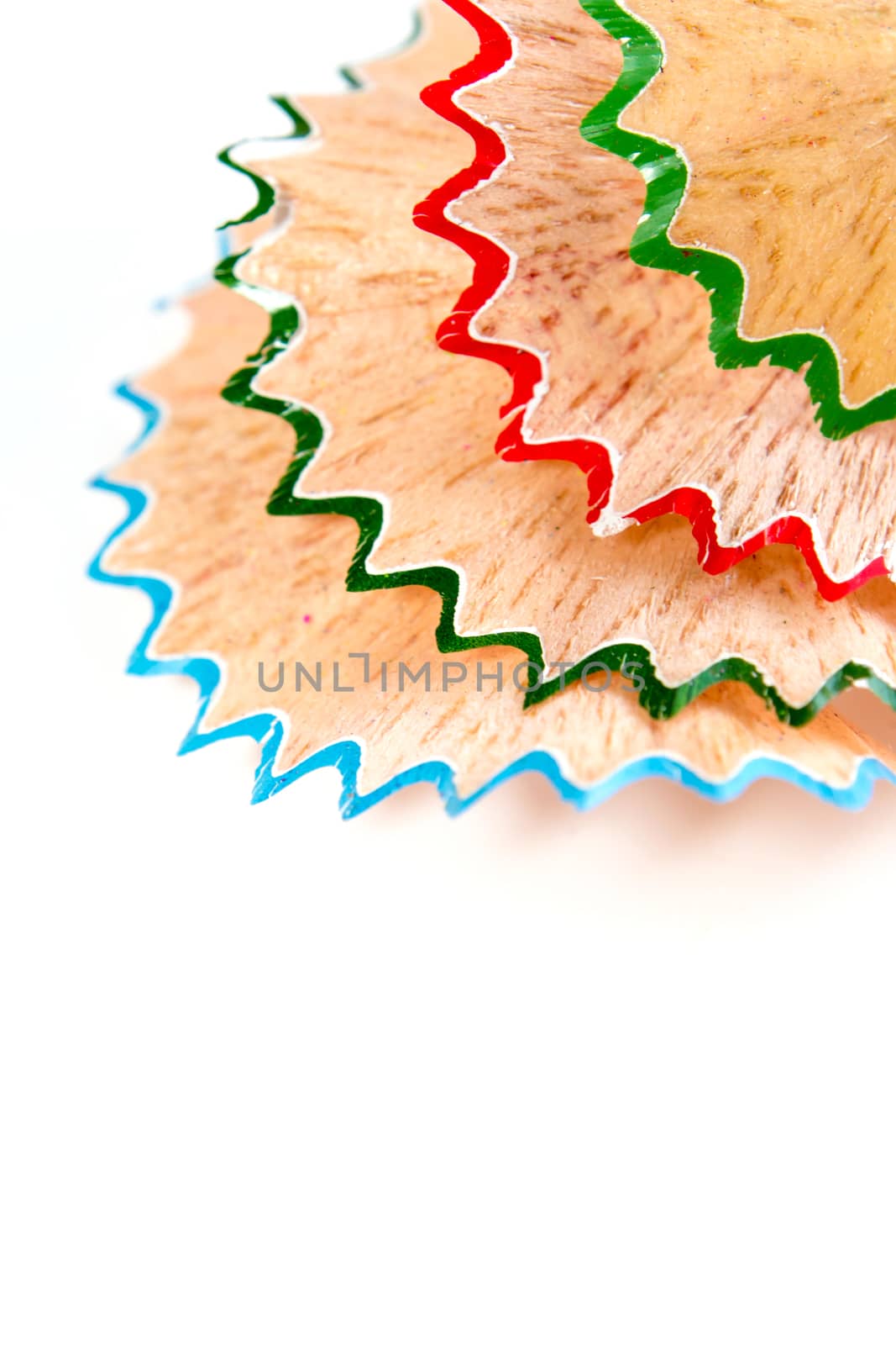 Space and colorful crayon pencil wood shavings