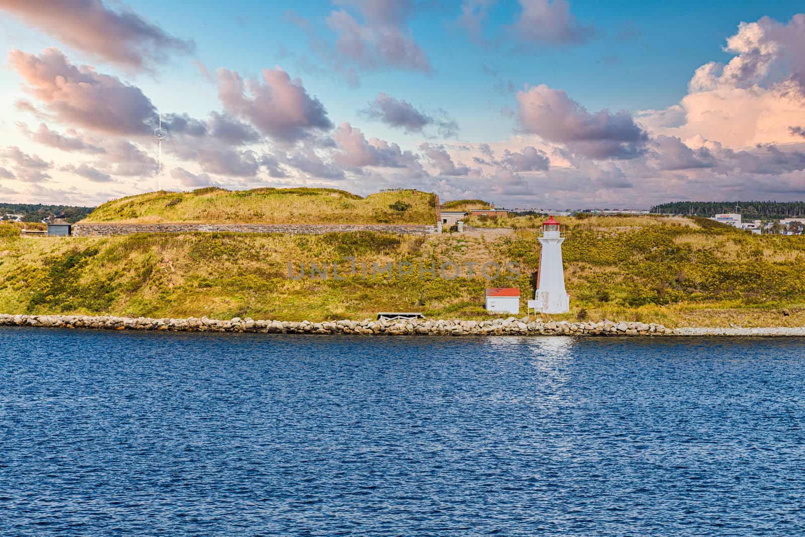 White Lighthouse by Blue Water by dbvirago