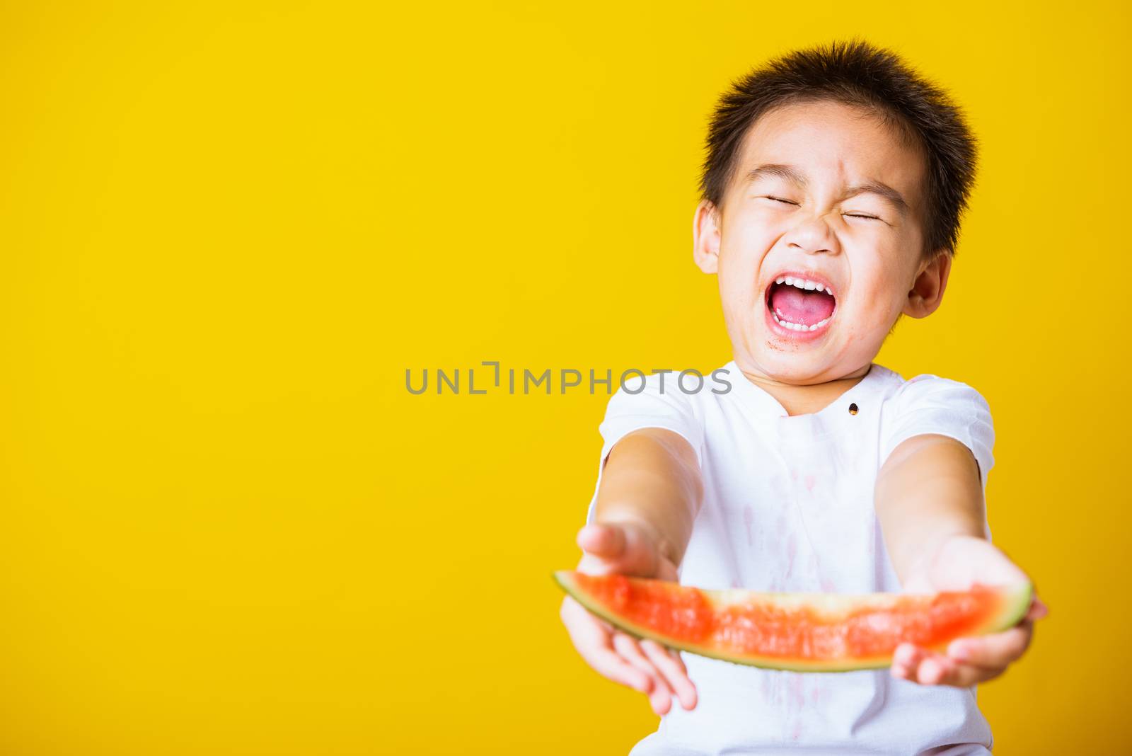 kid cute little boy attractive laugh smile playing holds cut wat by Sorapop