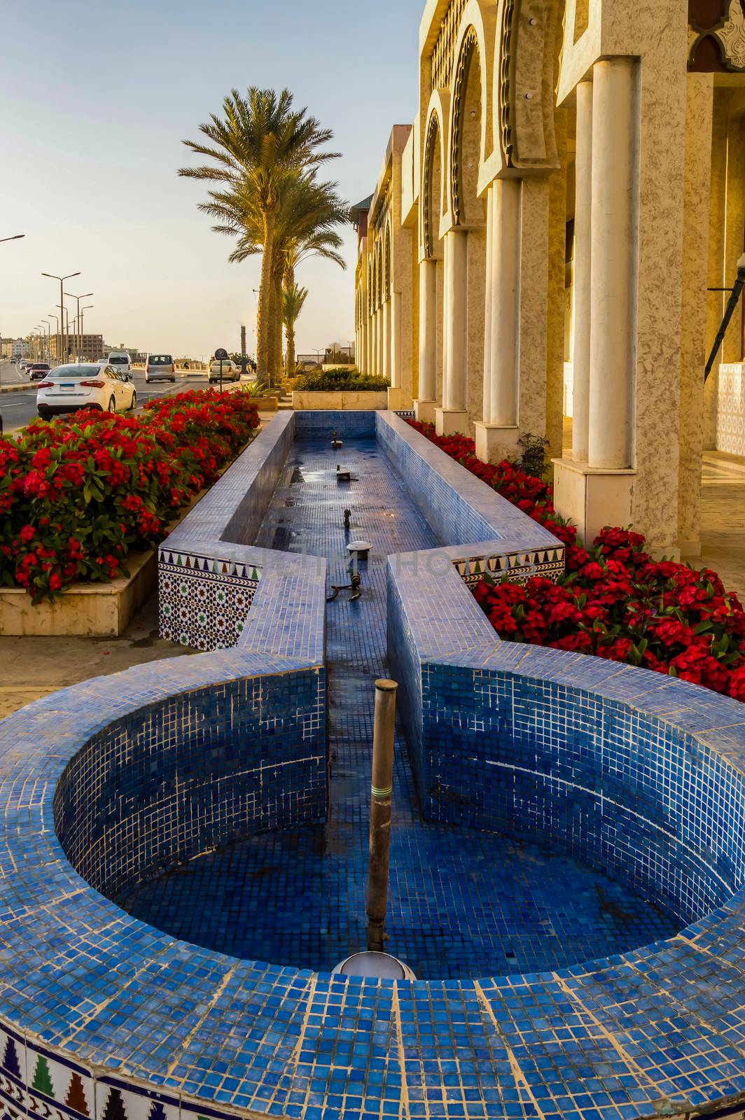 Empty blue fountain in front of a hotel in Hurghada, Egypt