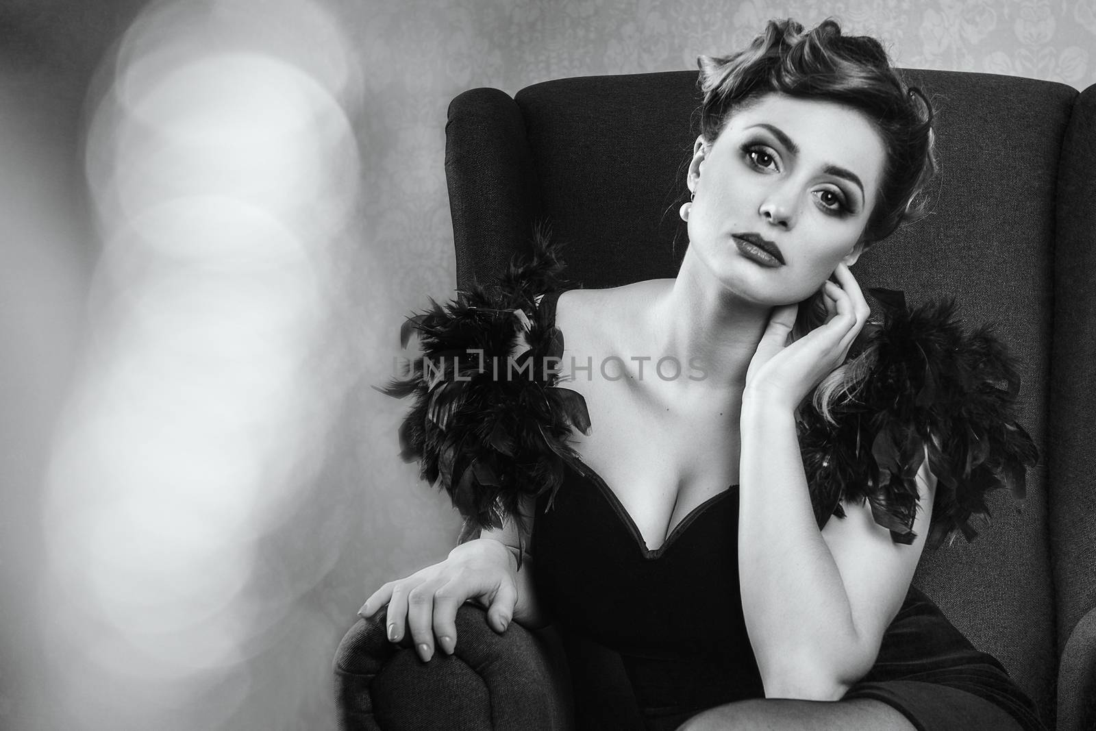 young brunette model girl and actress in a chair, black and whit by Andreua