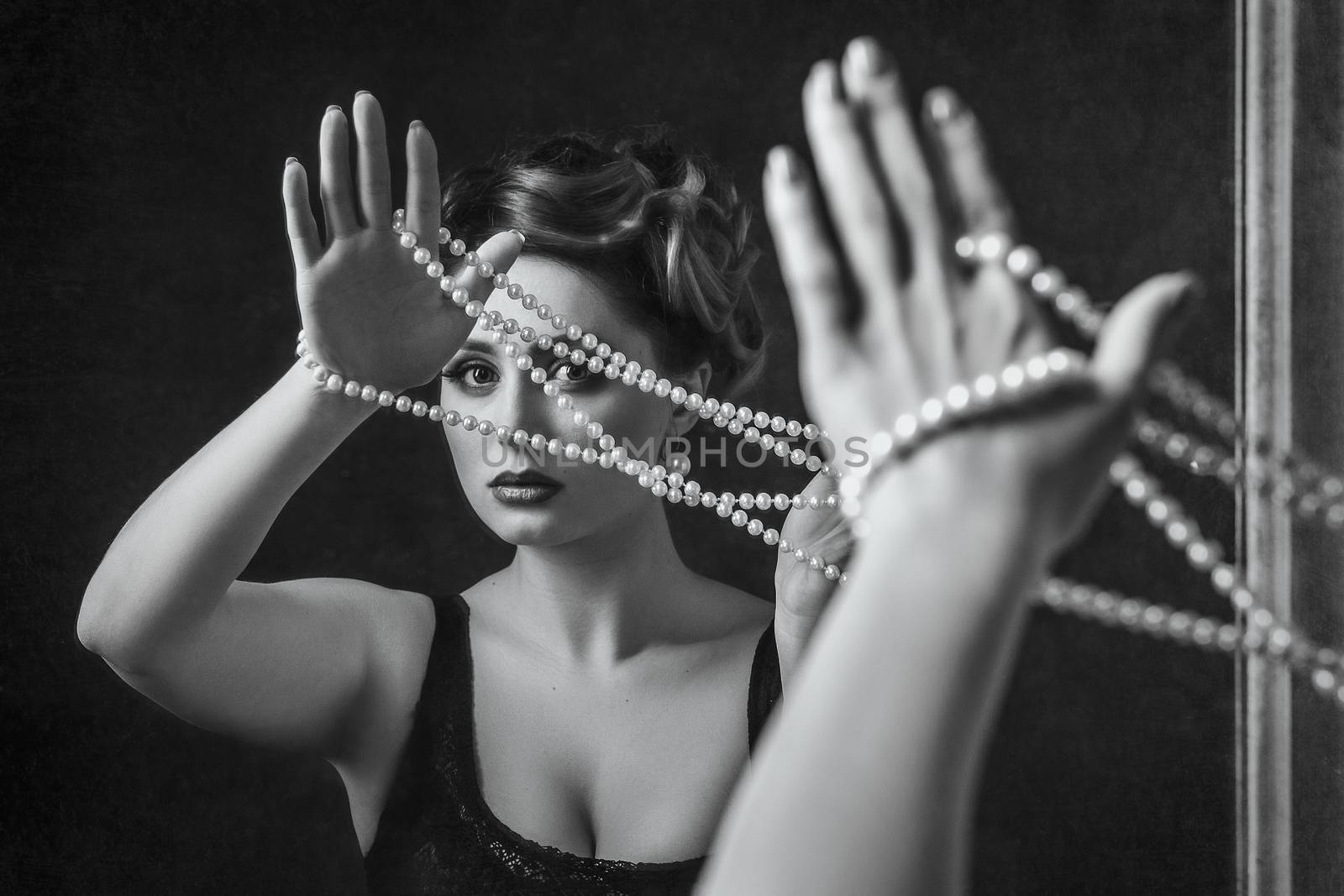 young brunette model girl and actress with pearl beads, black an by Andreua