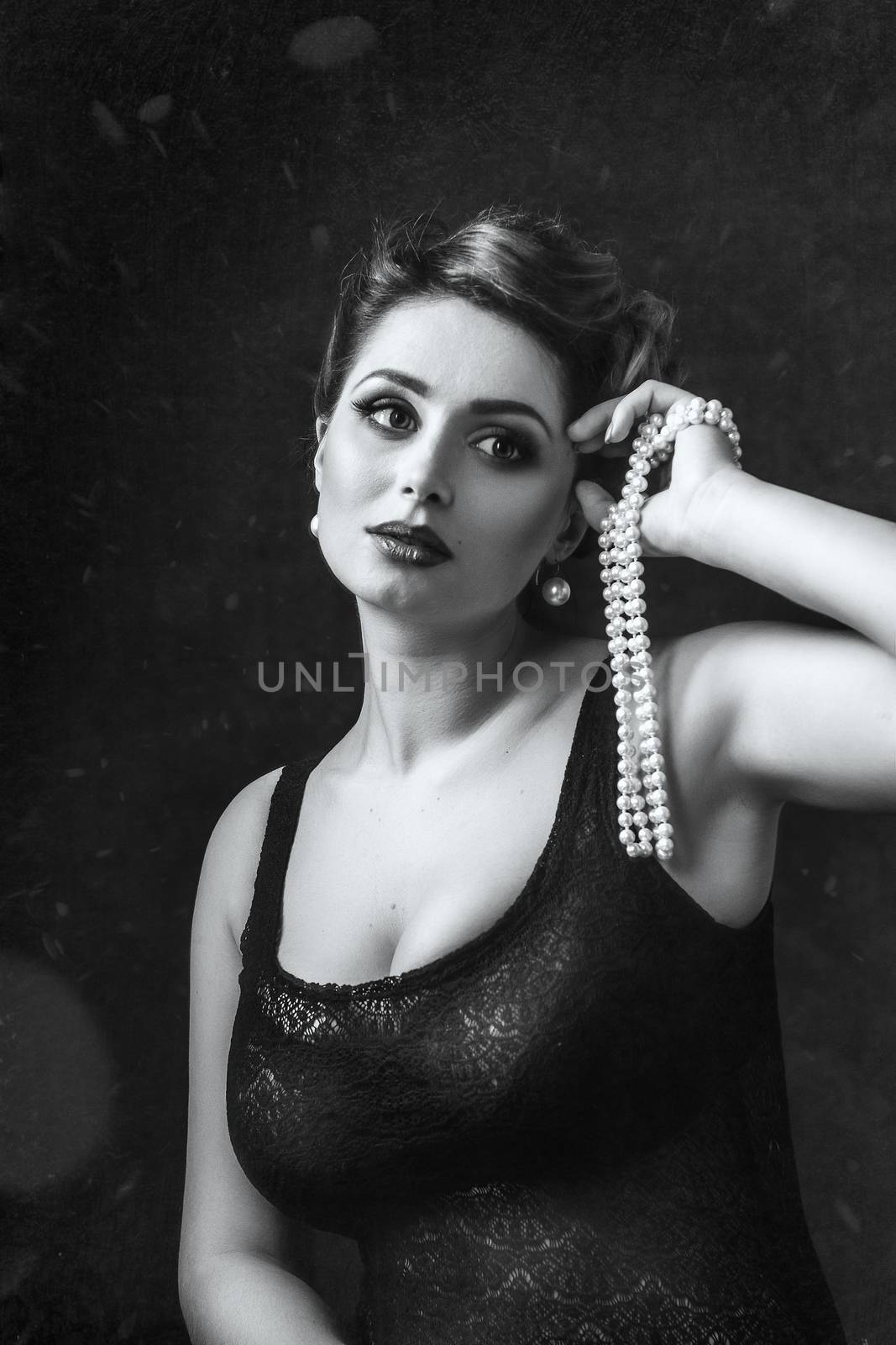 young brunette model girl and actress with pearl beads, black an by Andreua