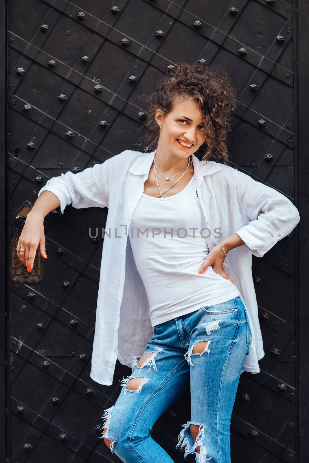 young girl walking on the old streets poland of europe