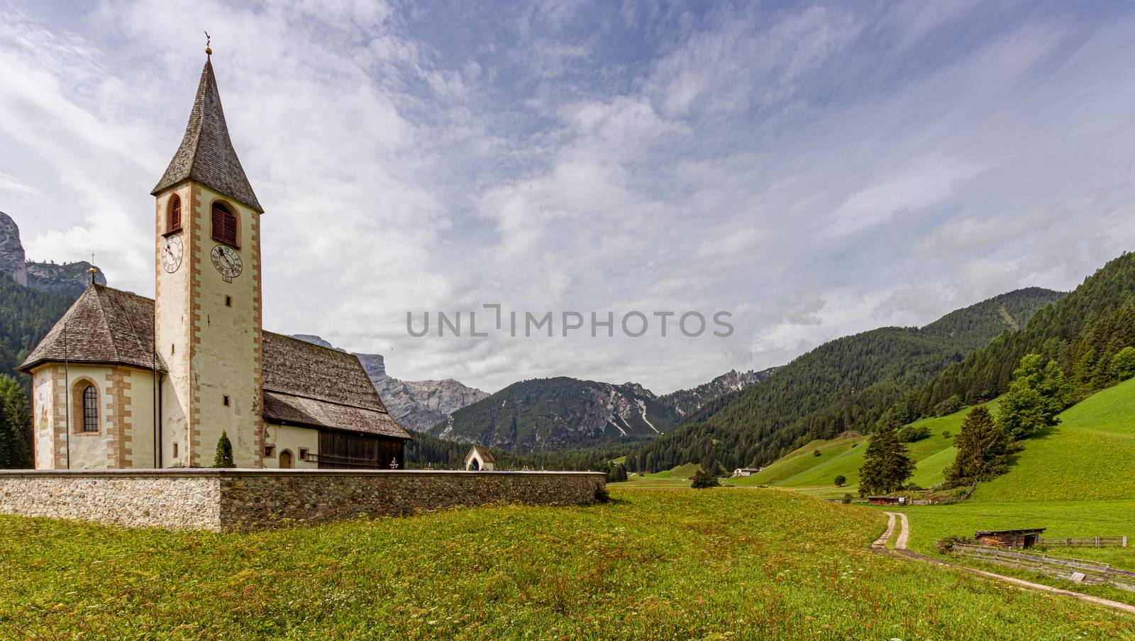 View from the meadows of the Parish Church of San Vito in the Puster Valley in Trentino Alto Adige, Italy